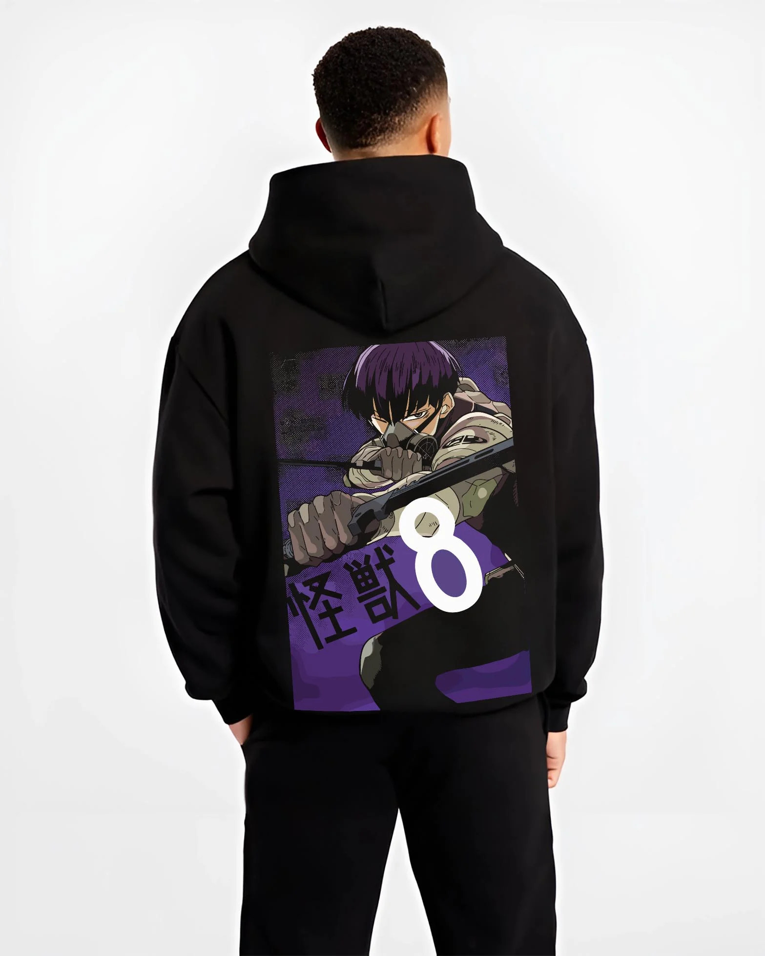 Black hoodie worn by male model, back view with Kaiju No. 8 Hoodie Squad Fighters Ready for Battle graphic bold anime graphic.