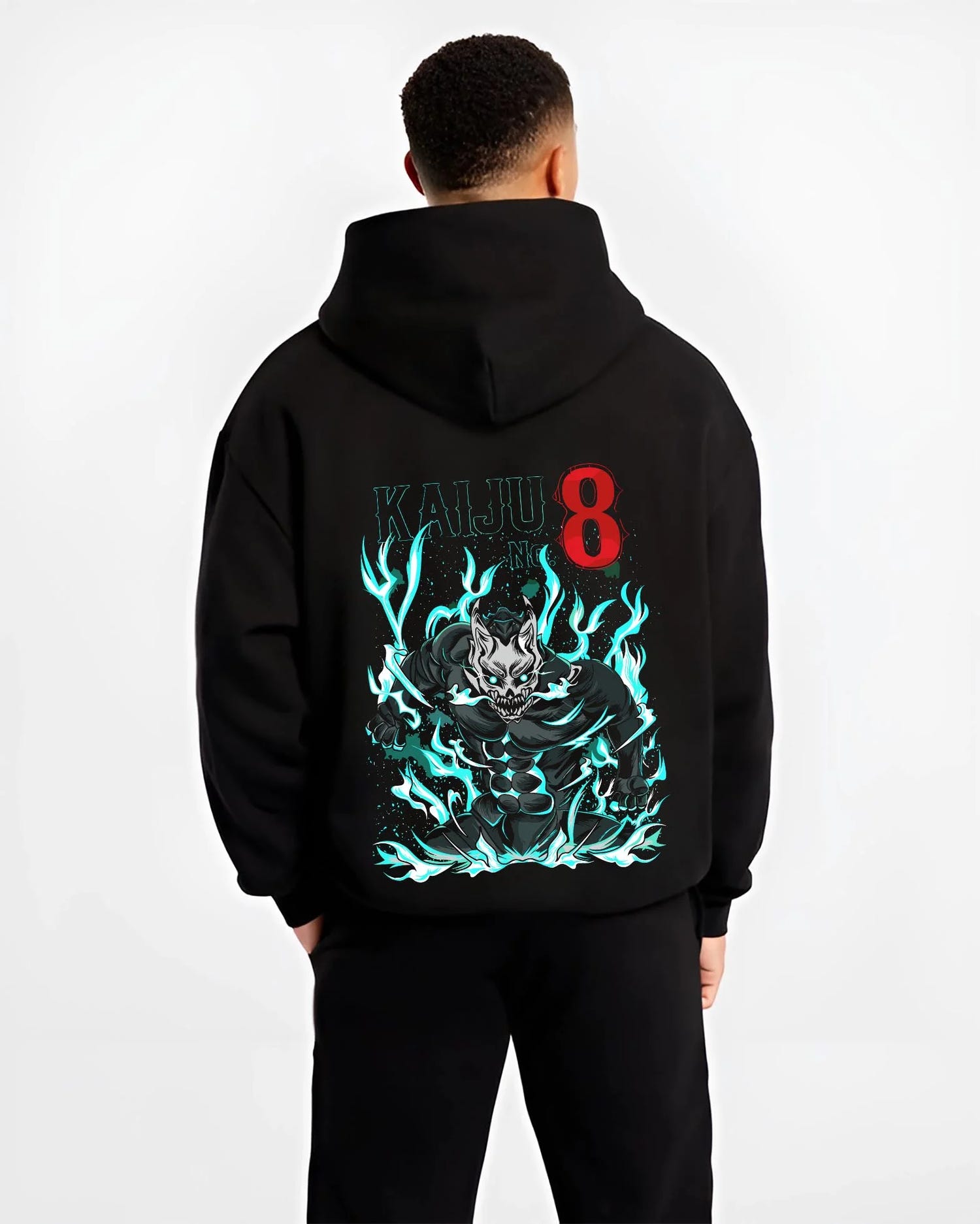Black hoodie worn by male model, back view with Kaiju No. 8 Hoodie Fiery Transformation Epic Pose graphic premium wear.