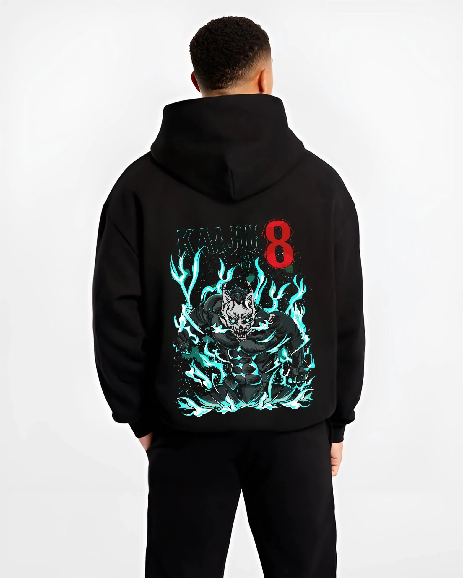 Black hoodie worn by male model, back view with Kaiju No. 8 Hoodie Fiery Transformation Epic Pose graphic premium wear.
