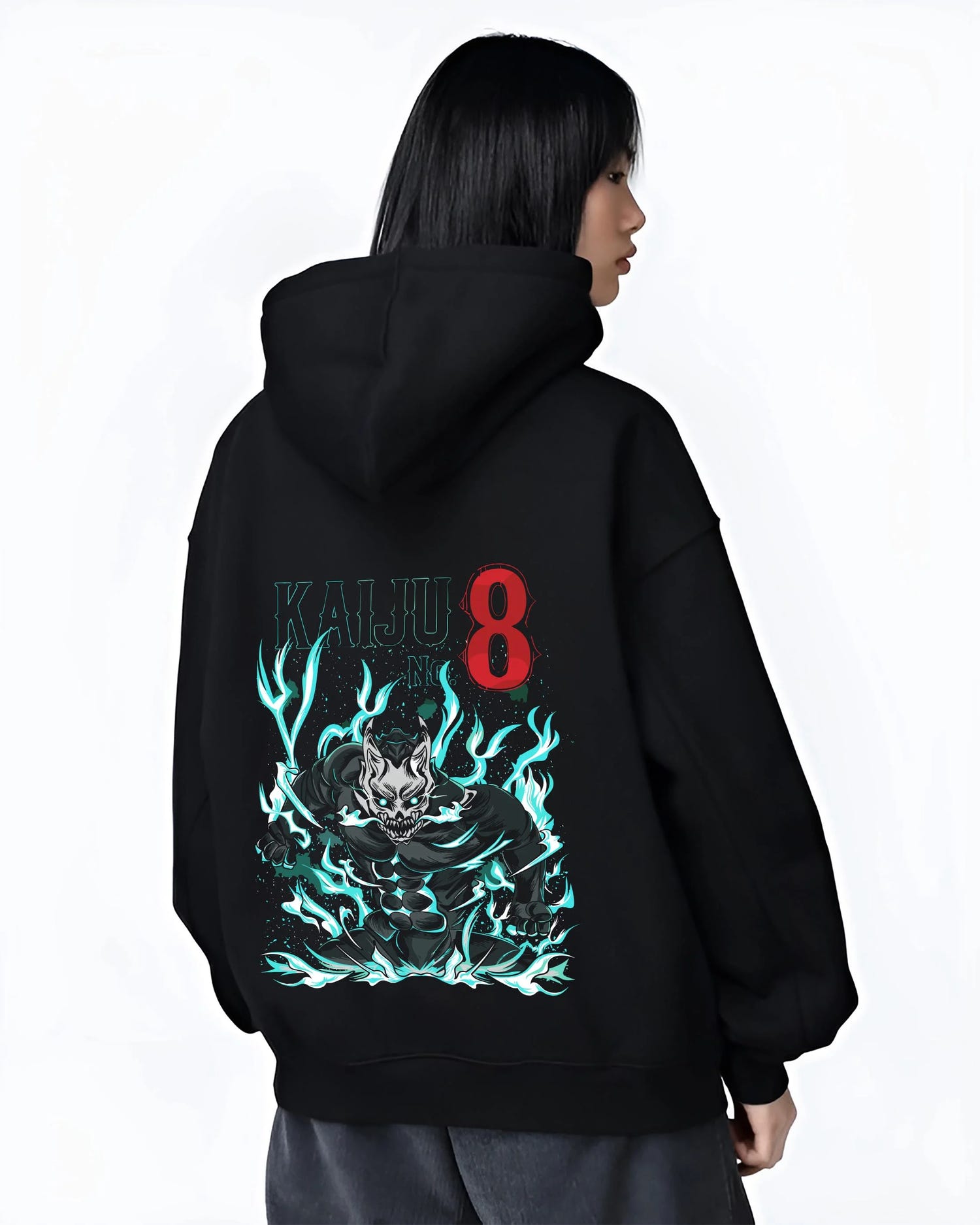Black hoodie worn by female model, back view with Kaiju No. 8 Hoodie Fiery Transformation Epic Pose graphic premium wear.