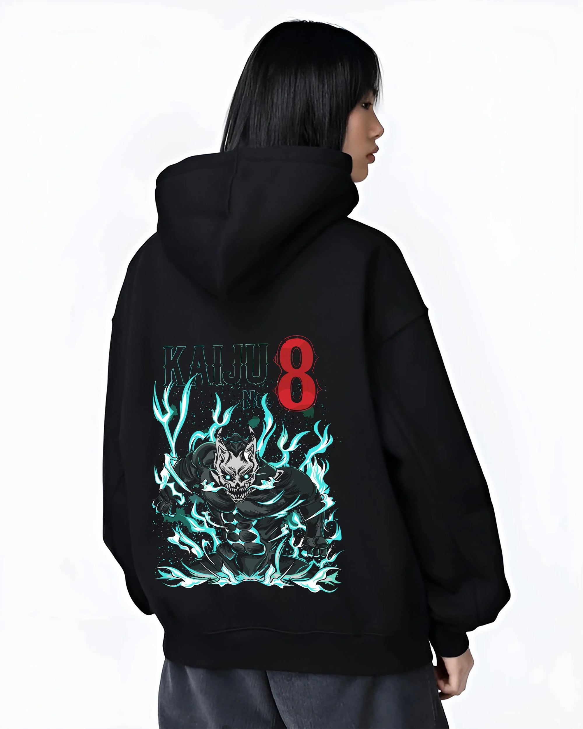 Black hoodie worn by female model, back view with Kaiju No. 8 Hoodie Fiery Transformation Epic Pose graphic premium wear.