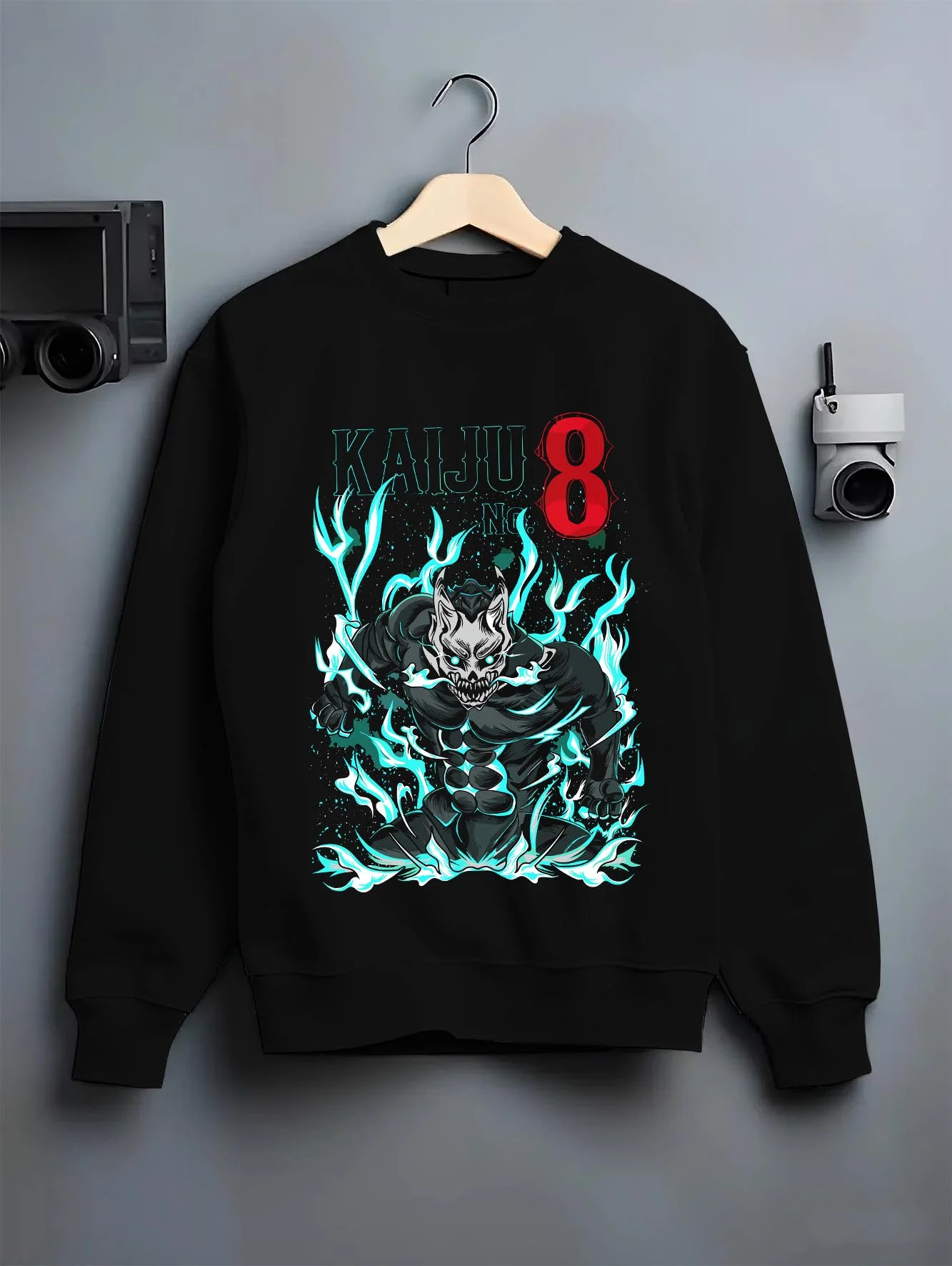 Black crewneck sweatshirt on hanger with Kaiju No. 8 Hoodie Fiery Transformation Epic Pose graphic streetwear graphic.