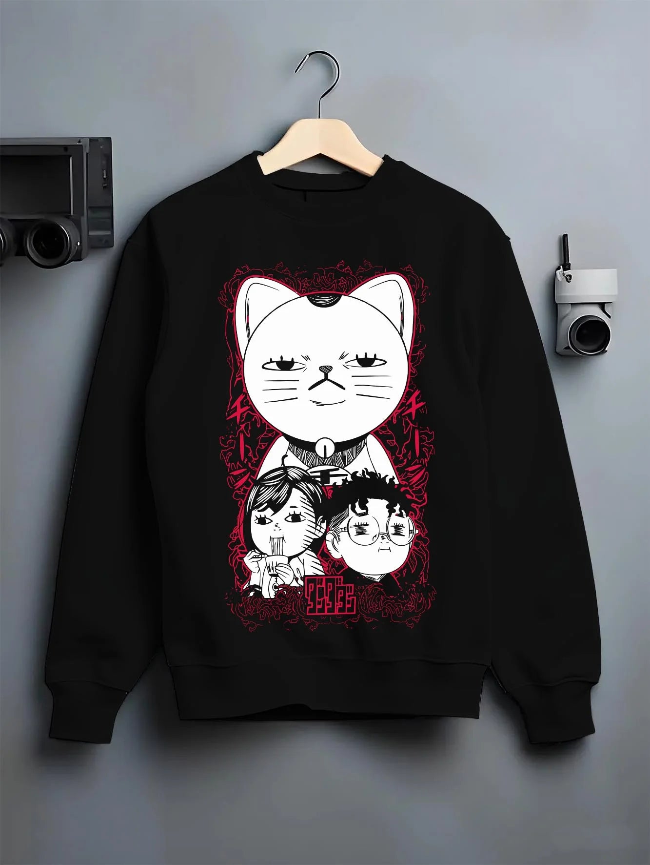 Black crewneck sweatshirt on hanger with Dandadan Turbo Granny Hoodie Lucky Cat Anime Jumper graphic streetwear graphic.