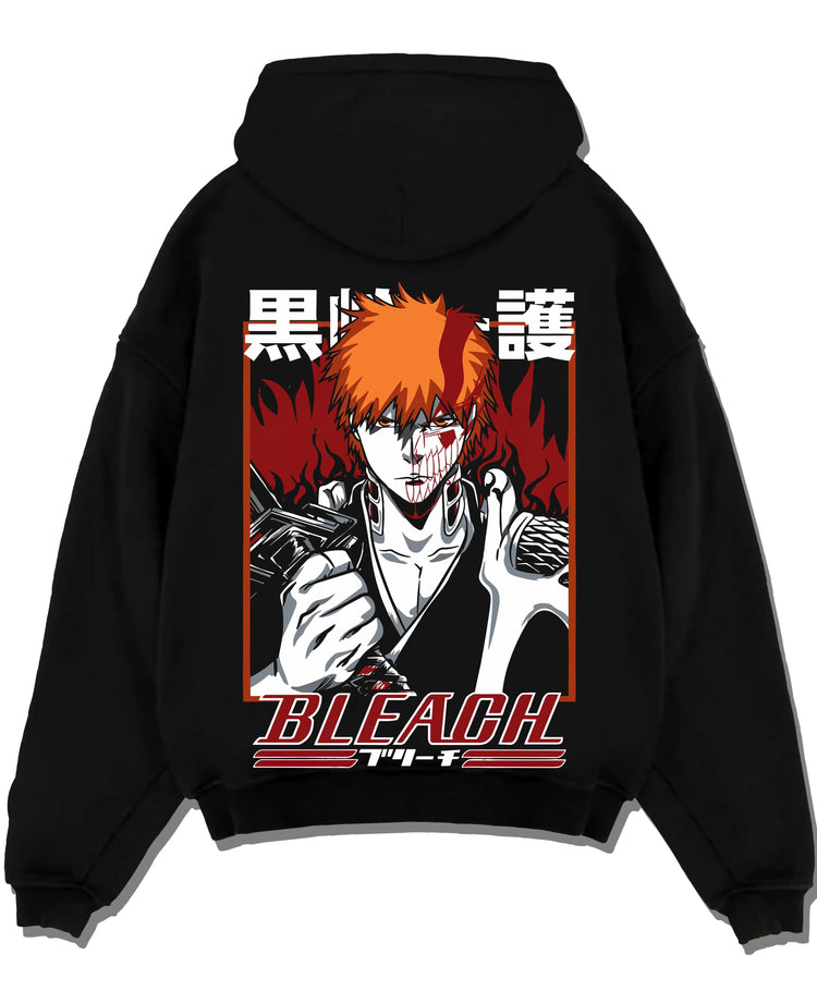 Black pullover hoodie laid flat with Ichigo Bankai Battle Hoodie Bleach Anime Soul Reaper graphic premium wear.