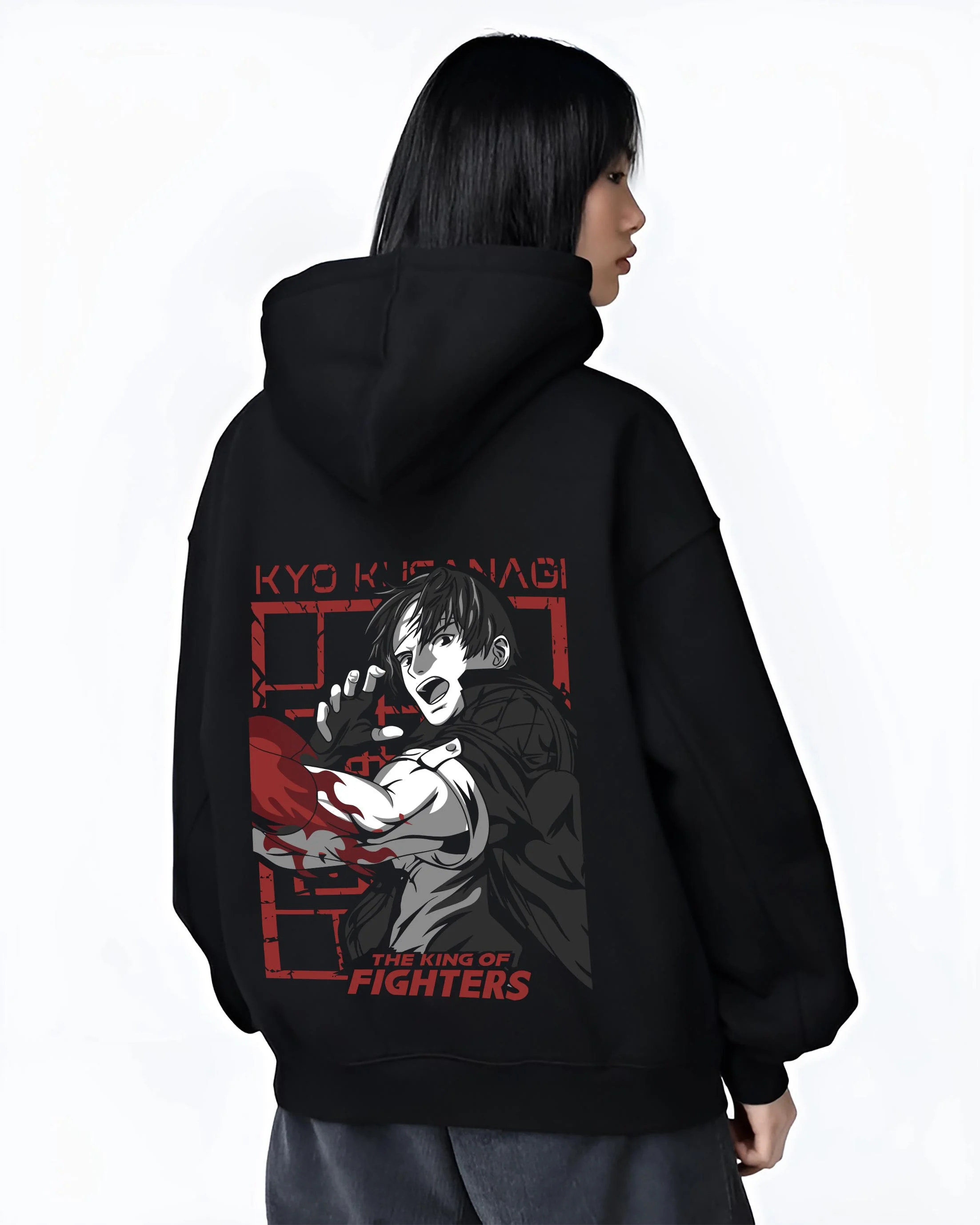 Black hoodie worn by female model, back view with King of Fighters Hoodie Ryo Sakazaki Fighting Stance graphic bold anime graphic.