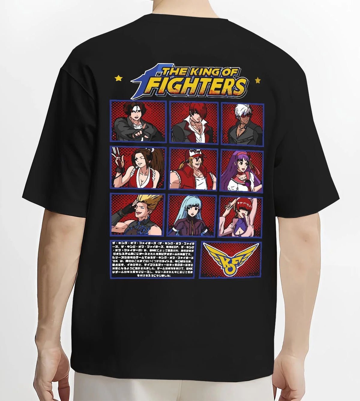 Black T-shirt worn by male model from the back featuring King of Fighters character roster artwork.