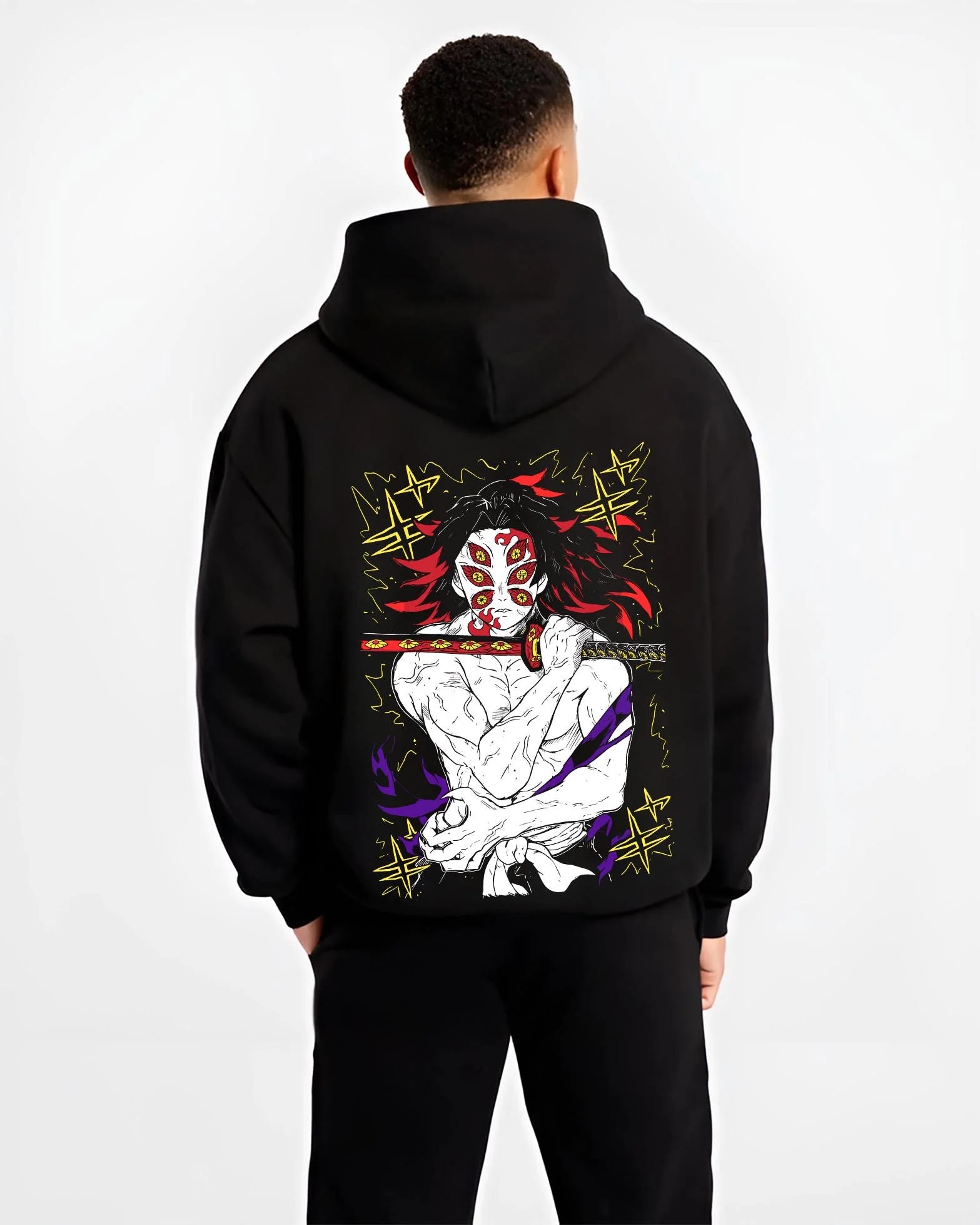 Black hoodie worn by male model, back view with Kimetsu no Yaiba Hoodie Upper Moon Douma Eye Mask graphic bold anime graphic.