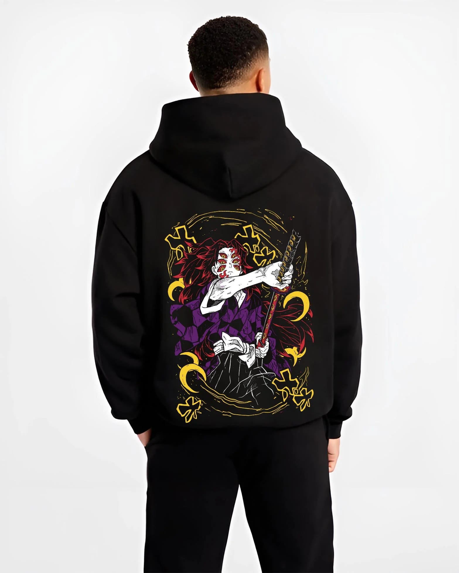 Black hoodie worn by male model, back view with Kimetsu no Yaiba Hoodie Upper Moon Kokushibo Crescent graphic premium wear.