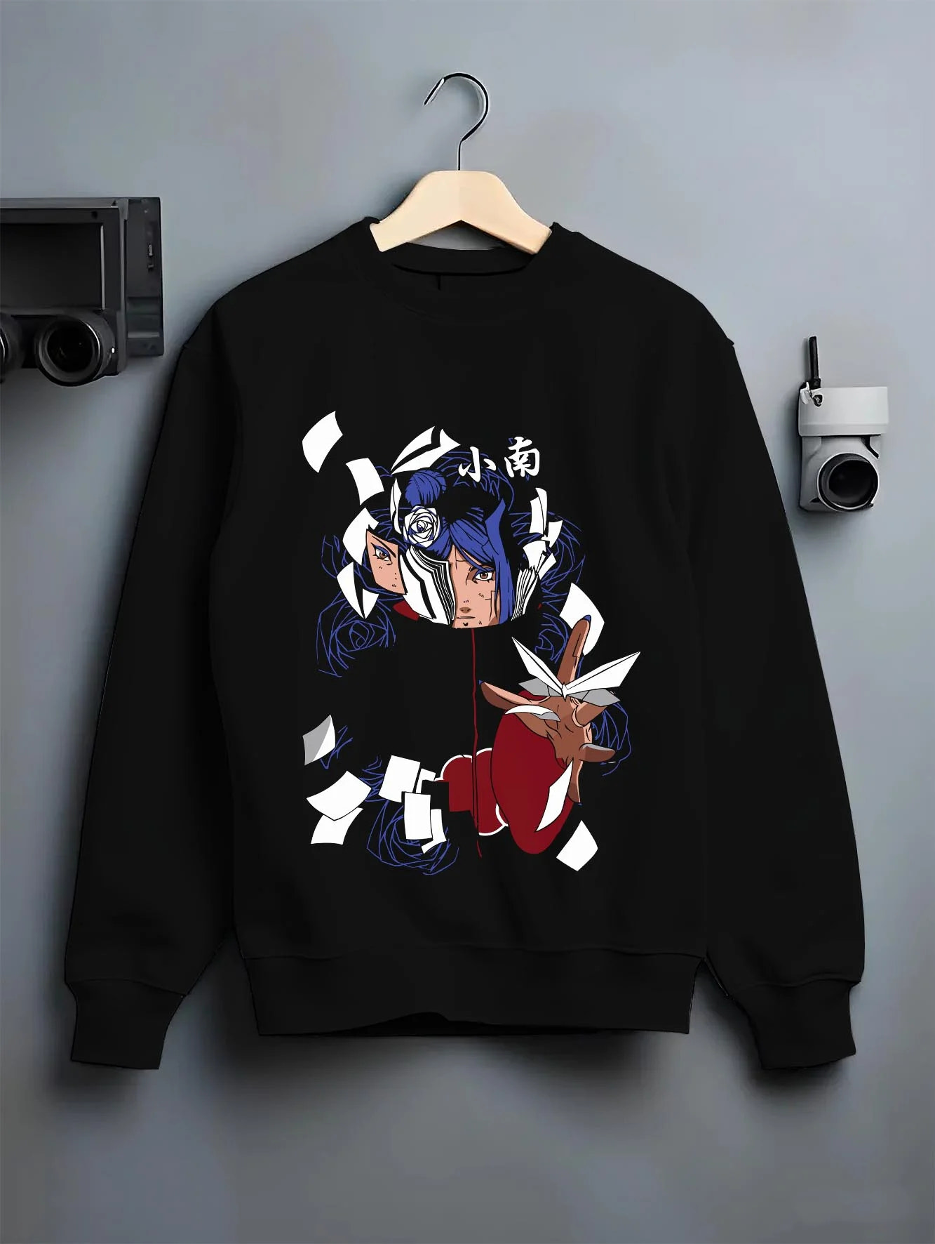Black crewneck sweatshirt on hanger with Chainsaw Man Hoodie Aki Hayakawa Curse Devil Contract graphic bold anime graphic.