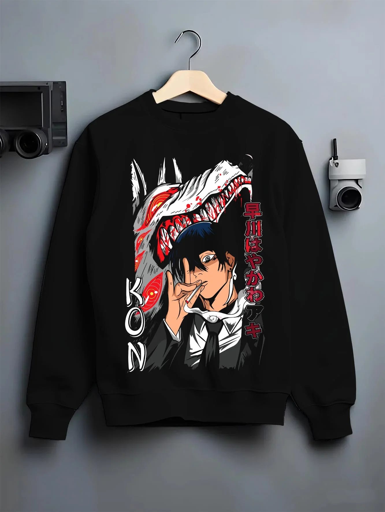 Black crewneck sweatshirt on hanger with Chainsaw Man Hoodie Aki Hayakawa Sword Spirit Power graphic premium wear.