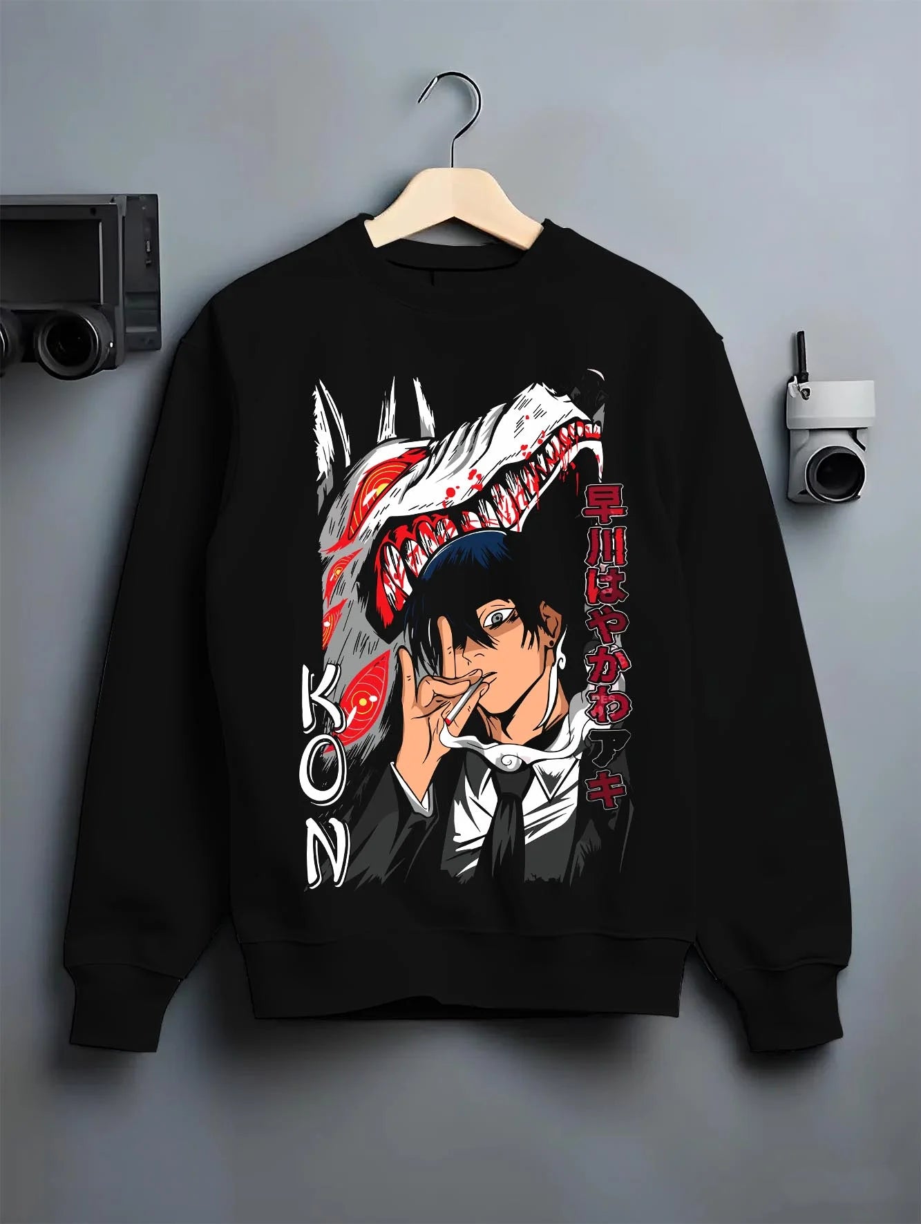 Black crewneck sweatshirt on hanger with Chainsaw Man Hoodie Aki Hayakawa Sword Spirit Power graphic premium wear.