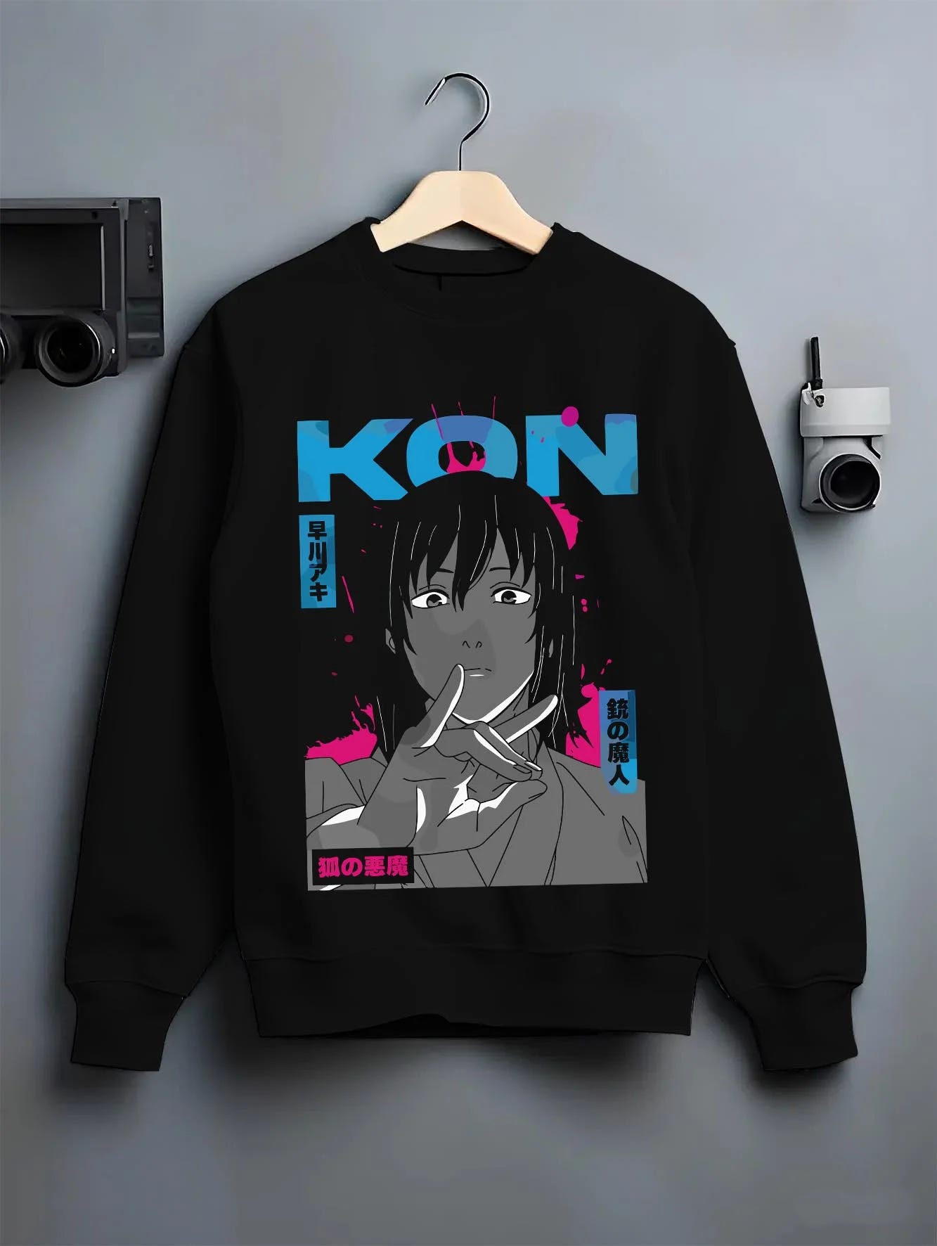 Black crewneck sweatshirt on hanger with Chainsaw Man Hoodie Aki Hayakawa Calm Determined Look graphic premium wear.