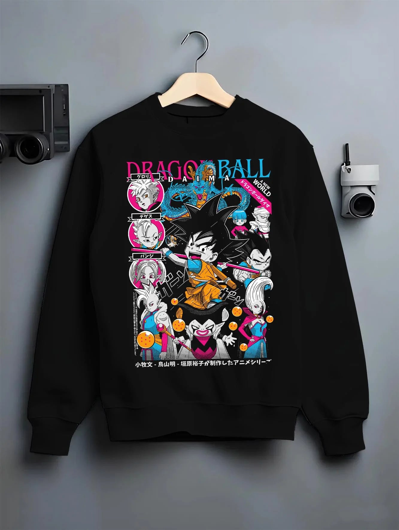 Black crewneck sweatshirt on hanger with Frieza Ball Dragon Ball Z Hoodie Villain Anime Jumper graphic Frieza anime design.