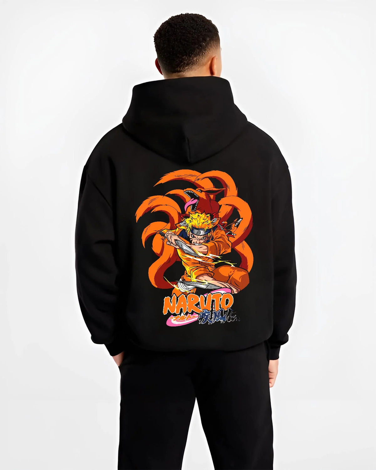 Black hoodie worn by male model from the back featuring Naruto Kurama Nine Tails chakra artwork.
