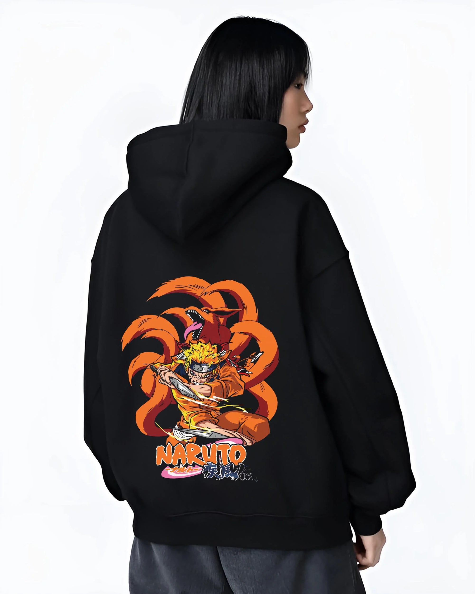 Black hoodie worn by female model, back view with Kaiju No. 8 Monster Transformation Hoodie Epic Battle graphic premium wear.