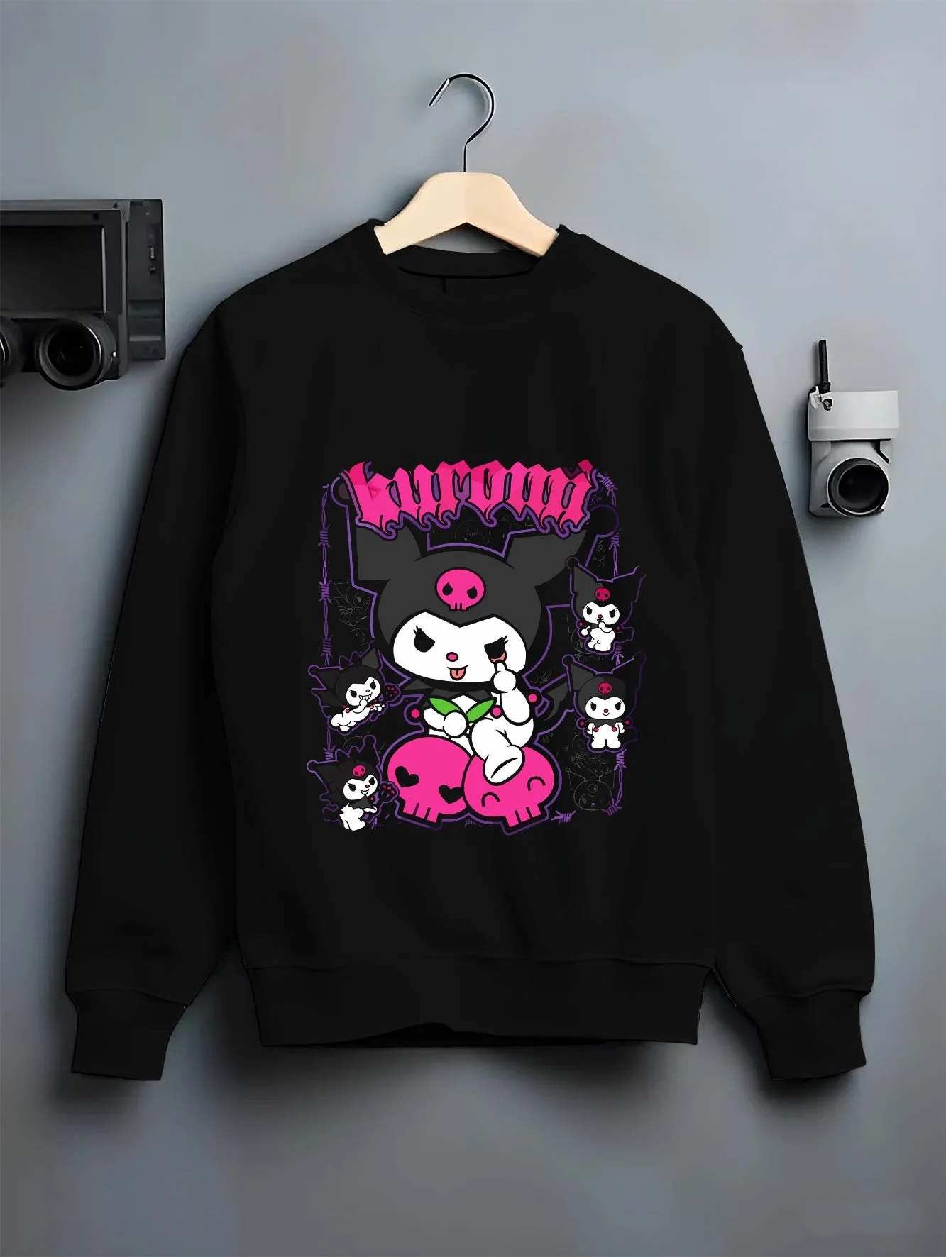 Black crewneck sweatshirt on hanger with Kaiju No. 8 Kafka Hibino Beast Awakening Hoodie graphic premium wear.