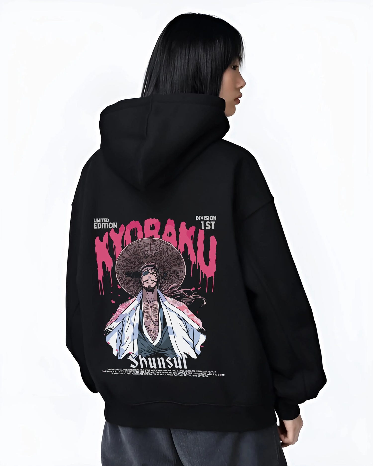 Black hoodie worn by female model, back view with Kaiju No. 8 Defense Force Team Hoodie Tactical graphic premium wear.