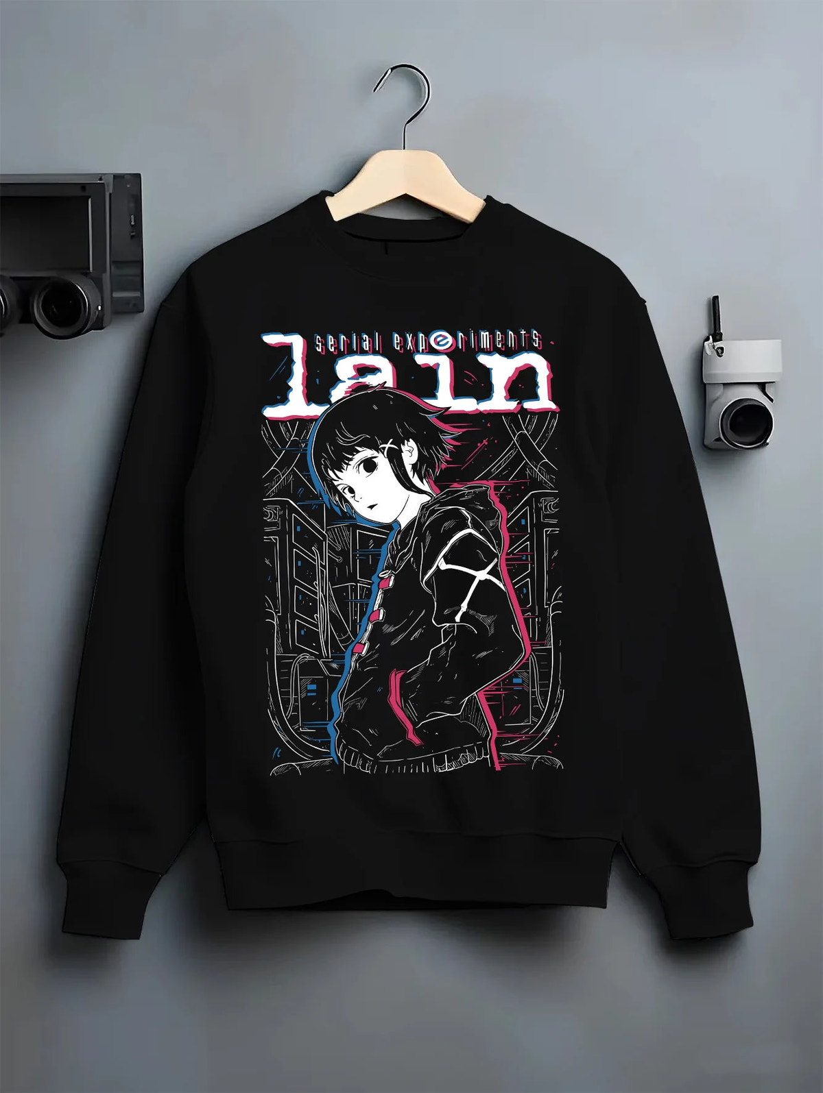 Black crewneck sweatshirt on hanger showing Lain Iwakura from Serial Experiments Lain: monochrome portrait