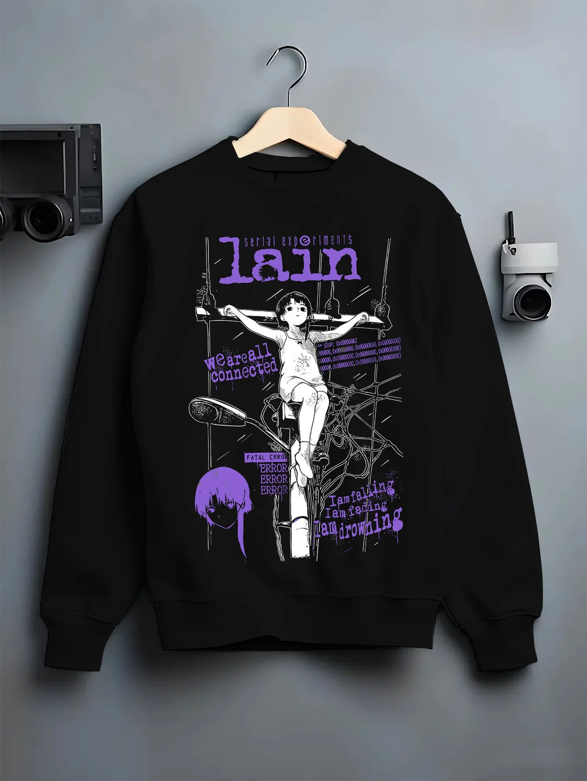 Black crewneck sweatshirt on hanger with Lain Iwakura (Serial Experiments Lain) illustrated back graphic