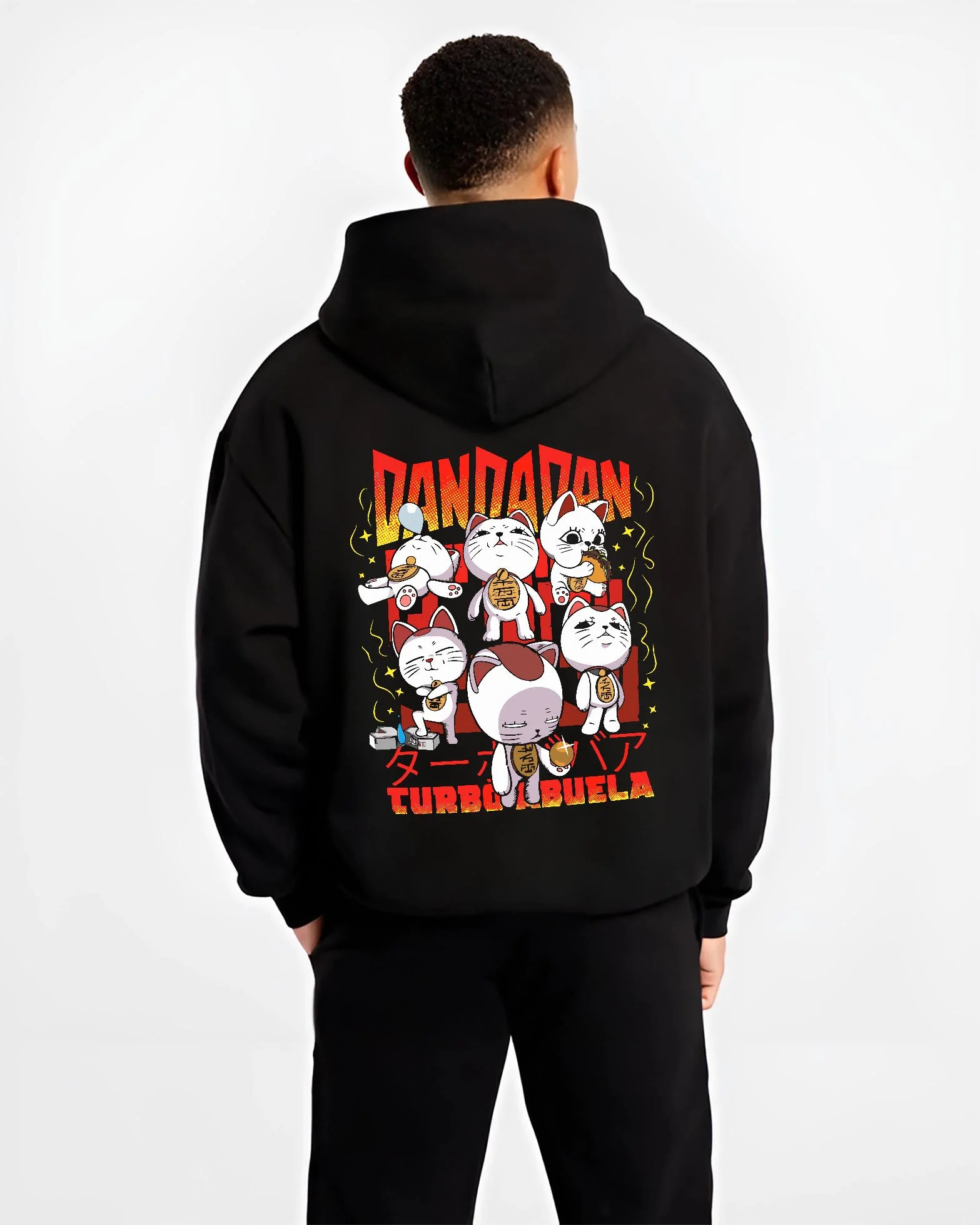 Black hoodie worn by male model, back view with Dandadan Turbo Granny Hoodie Cat Spirits Anime Jumper graphic bold anime graphic.