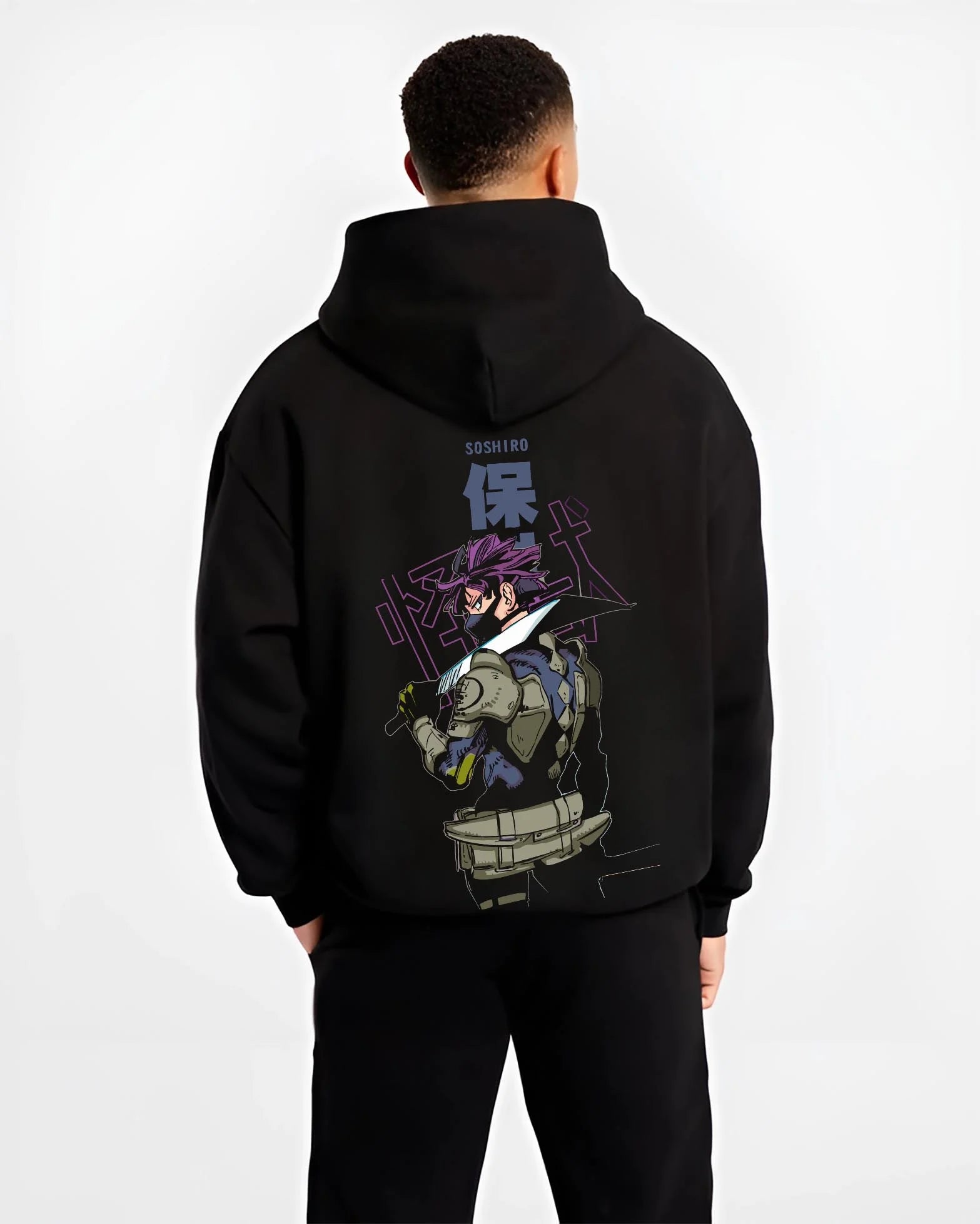 Black hoodie worn by male model, back view with Kaiju No. 8 Battle Stance Transformation Hoodie graphic bold anime graphic.