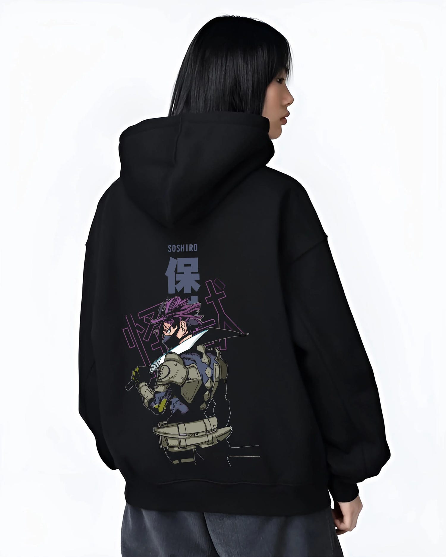 Black hoodie worn by female model, back view with Kaiju No. 8 Battle Stance Transformation Hoodie graphic bold anime graphic.
