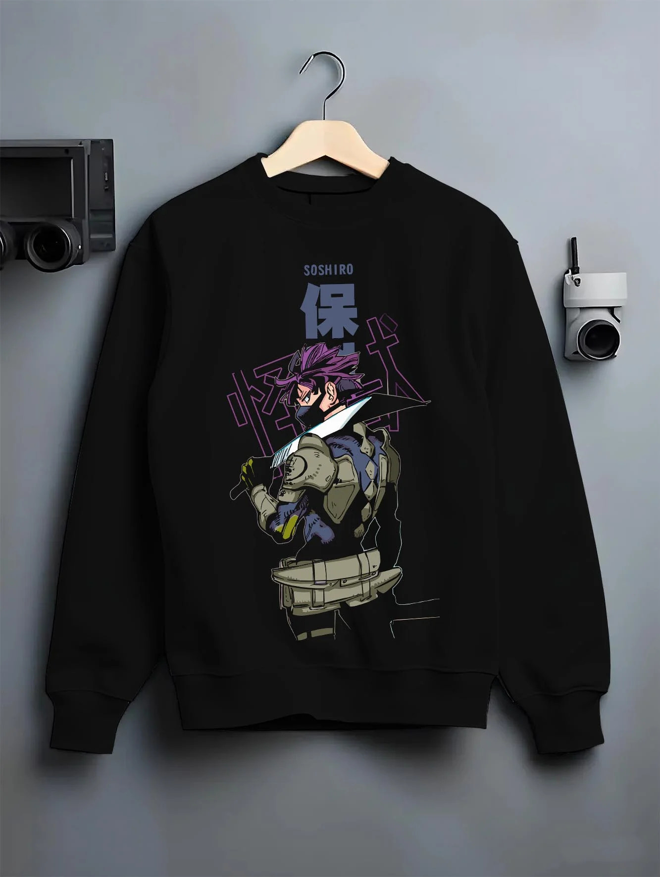 Black crewneck sweatshirt on hanger with Kaiju No. 8 Battle Stance Transformation Hoodie graphic premium wear.