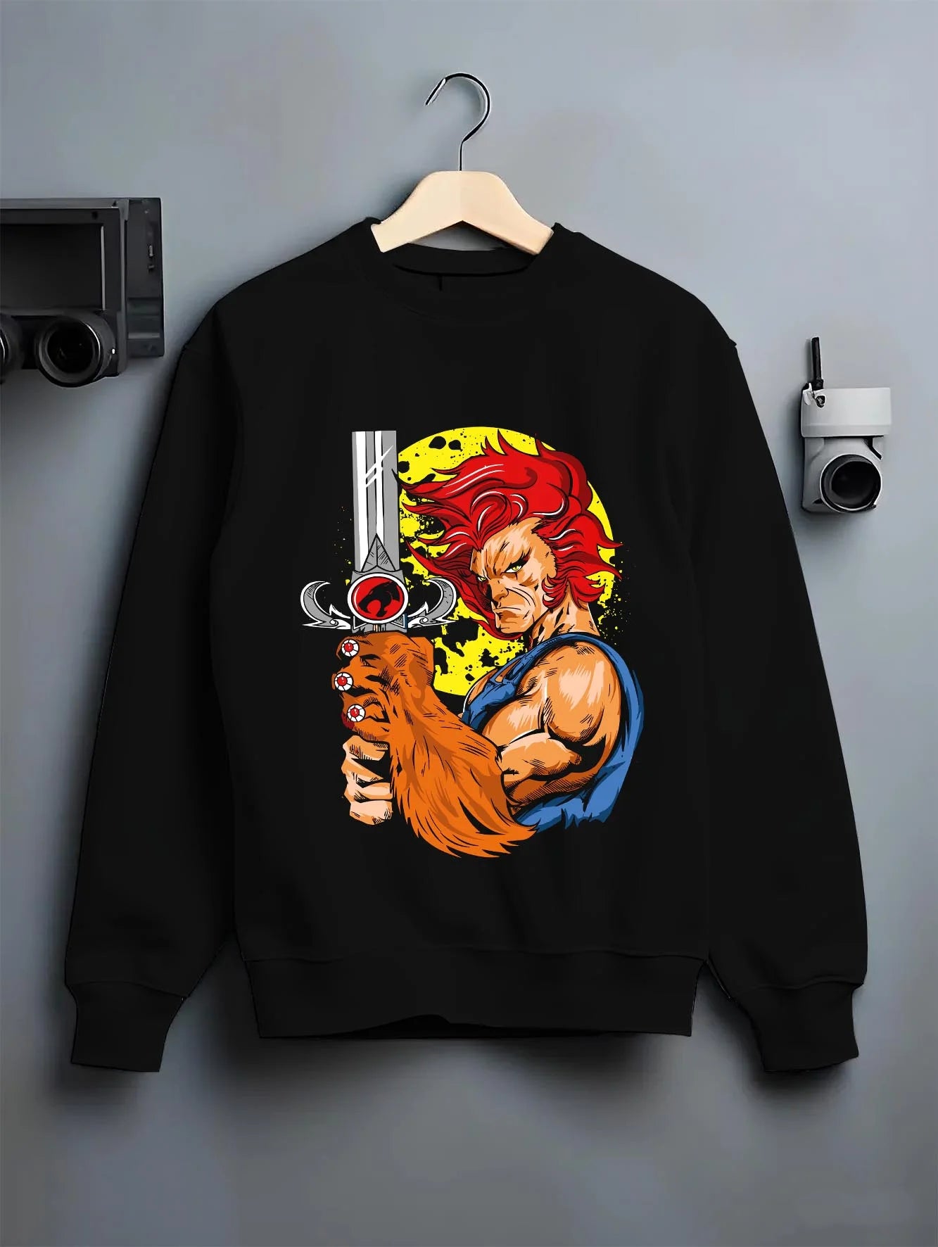 Black crewneck sweatshirt on hanger with Kaiju No. 8 Squad Fighters Ready Hoodie Action graphic bold anime graphic.