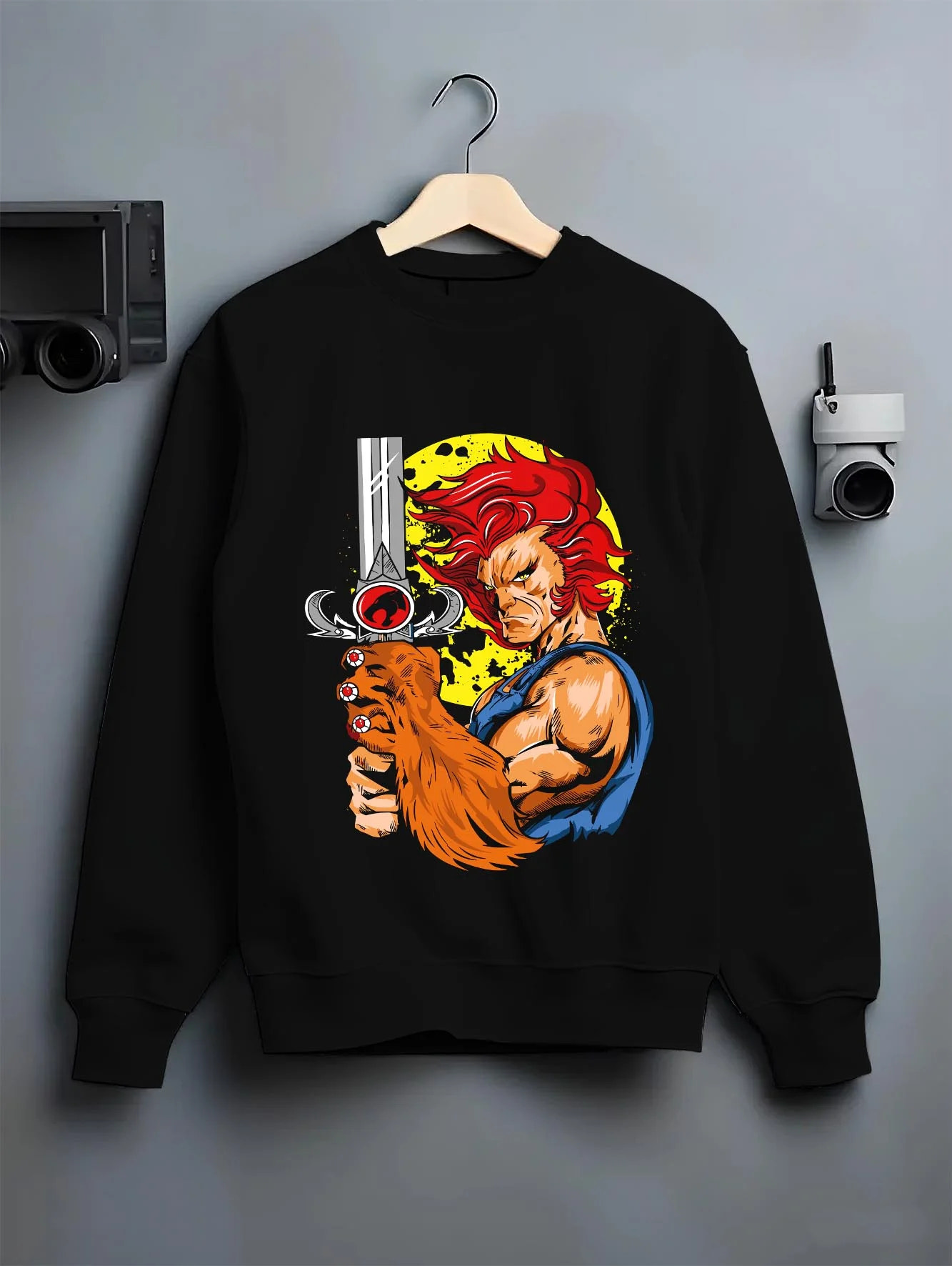 Black crewneck sweatshirt on hanger with Kaiju No. 8 Squad Fighters Ready Hoodie Action graphic bold anime graphic.