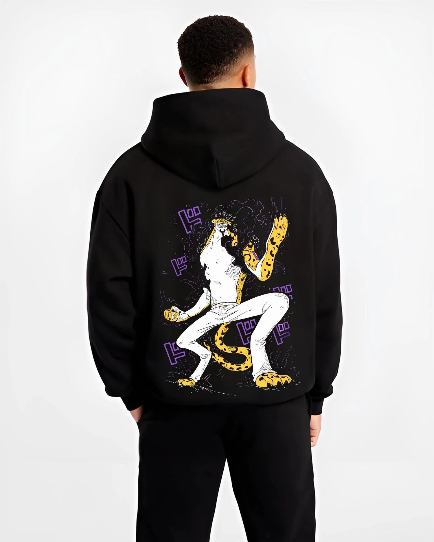 Black hoodie worn by male model, back view with Kaiju No. 8 Fiery Transformation Hoodie Heroic graphic streetwear graphic.
