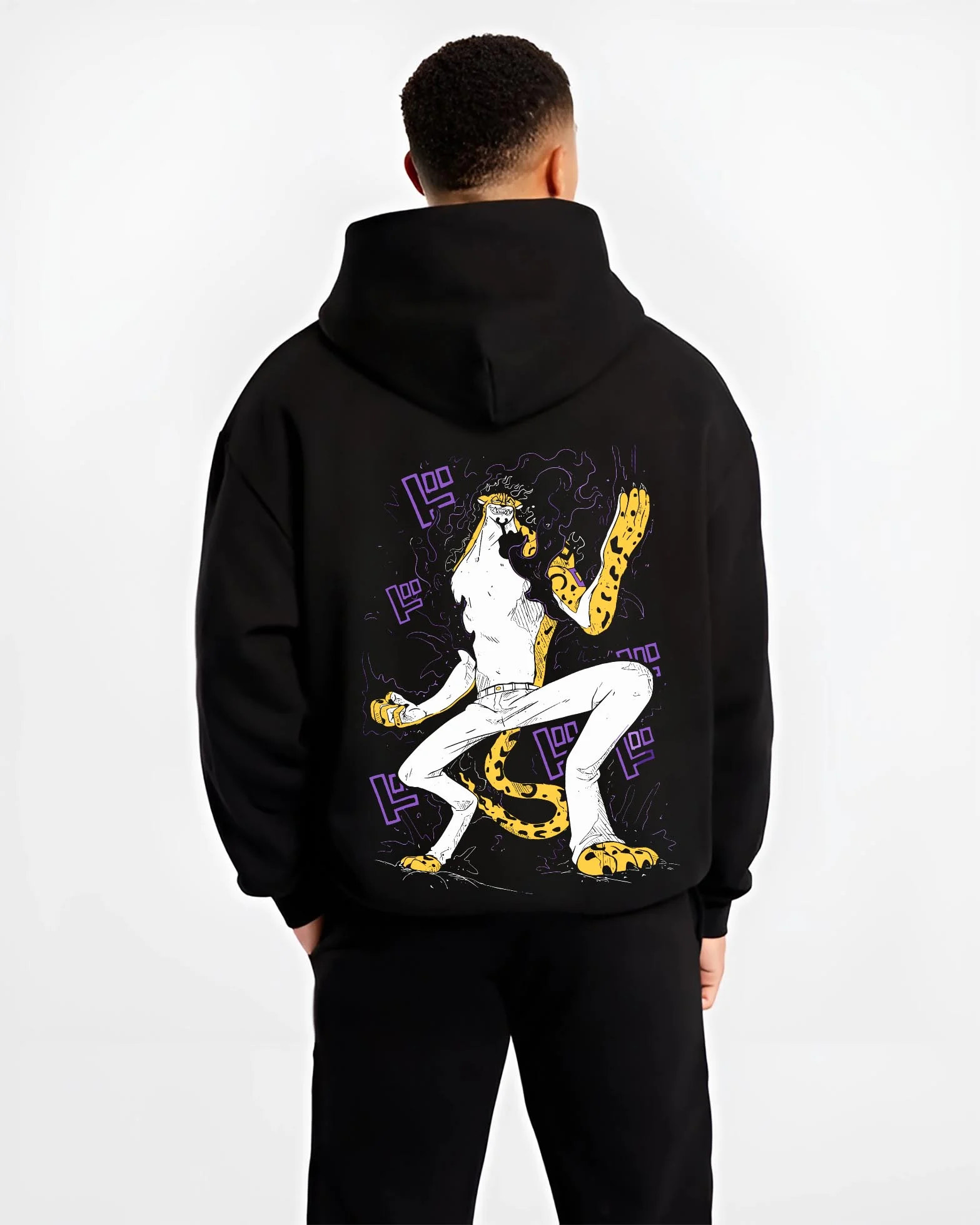 Black hoodie worn by male model, back view with Kaiju No. 8 Fiery Transformation Hoodie Heroic graphic streetwear graphic.