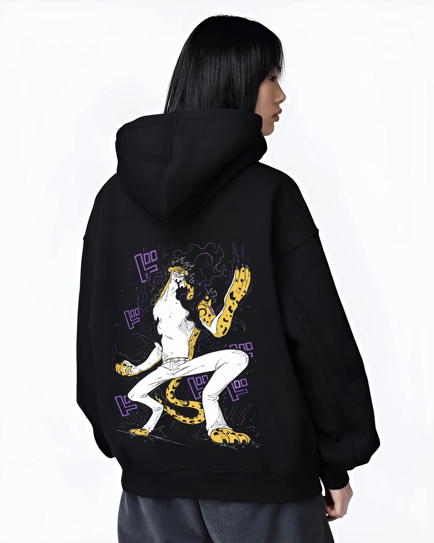 Black hoodie worn by female model, back view with Kaiju No. 8 Fiery Transformation Hoodie Heroic graphic bold anime graphic.