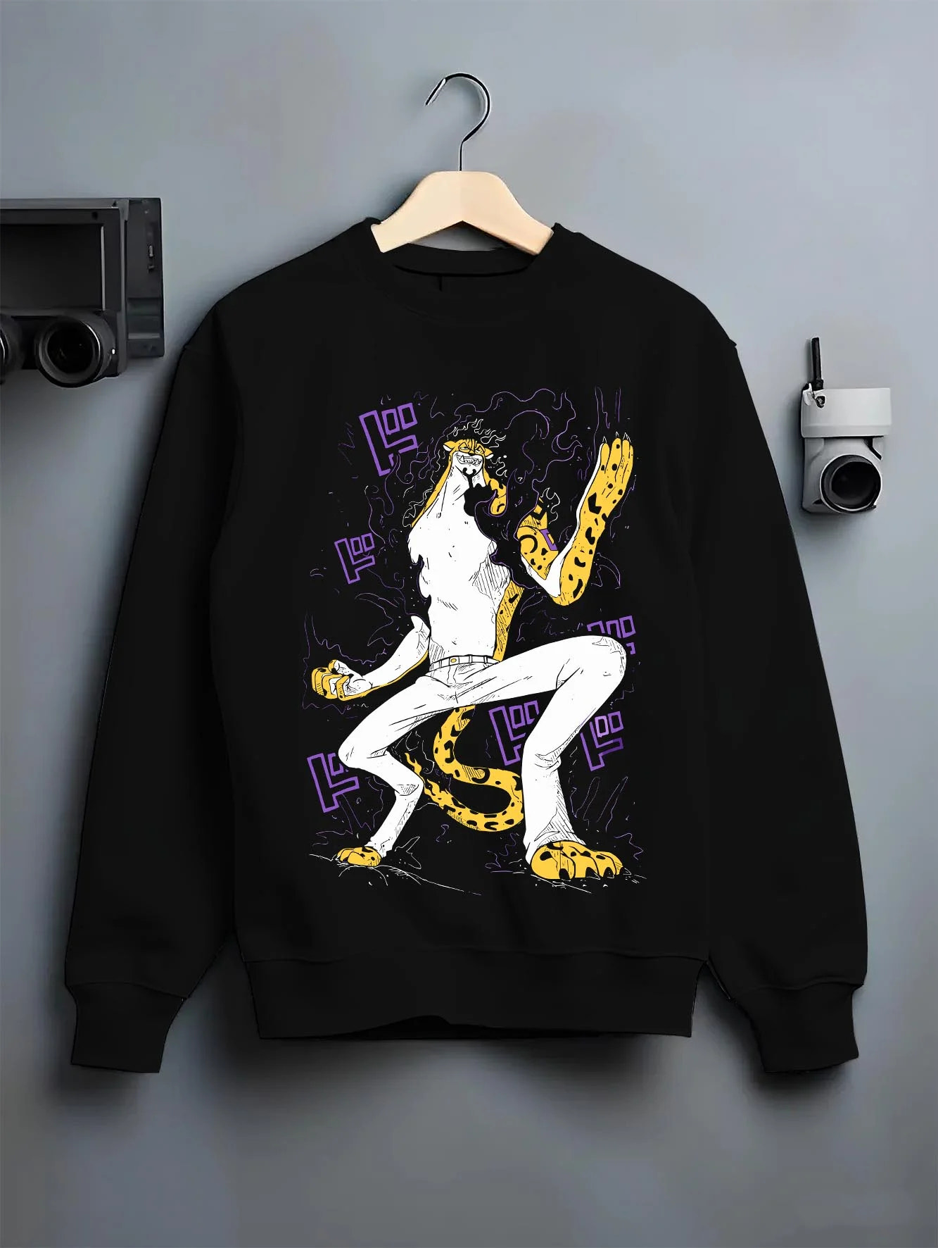 Black crewneck sweatshirt on hanger with Kaiju No. 8 Fiery Transformation Hoodie Heroic graphic streetwear graphic.