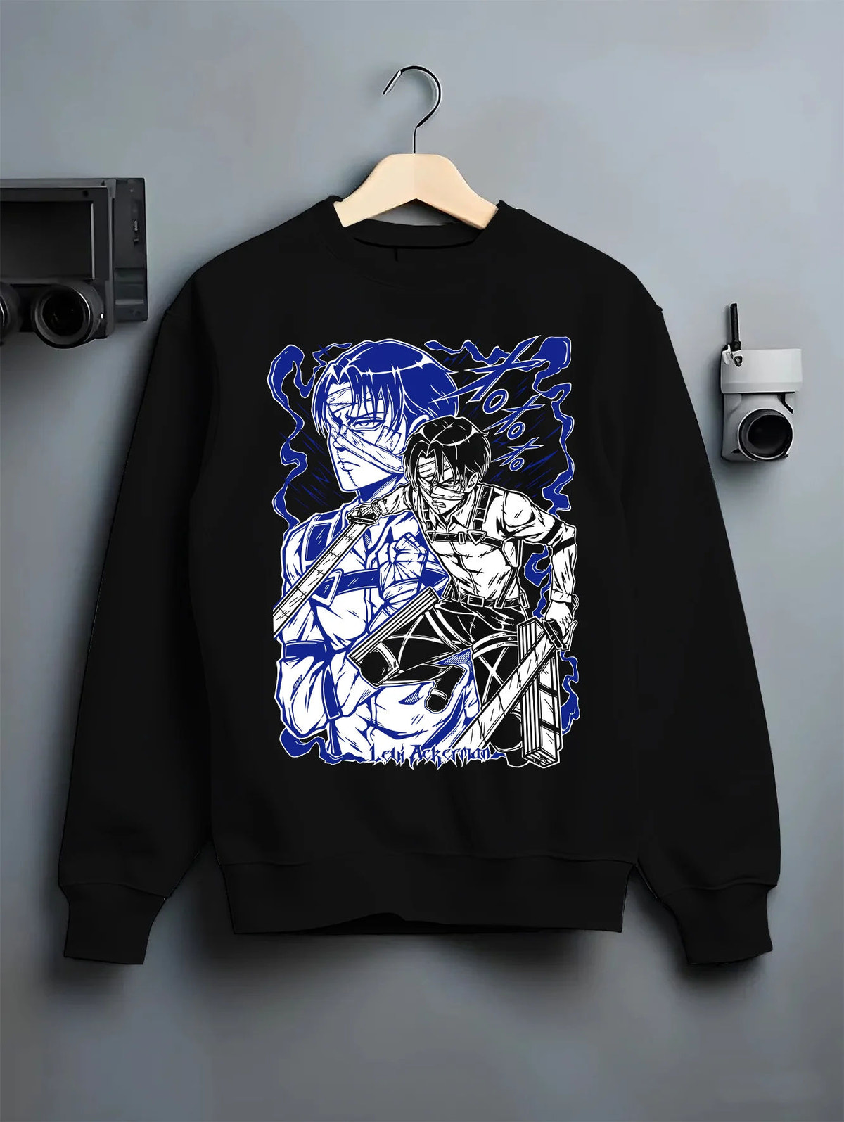 Black crewneck sweatshirt on hanger showing Levi Ackerman from Attack on Titan: blue manga portrait