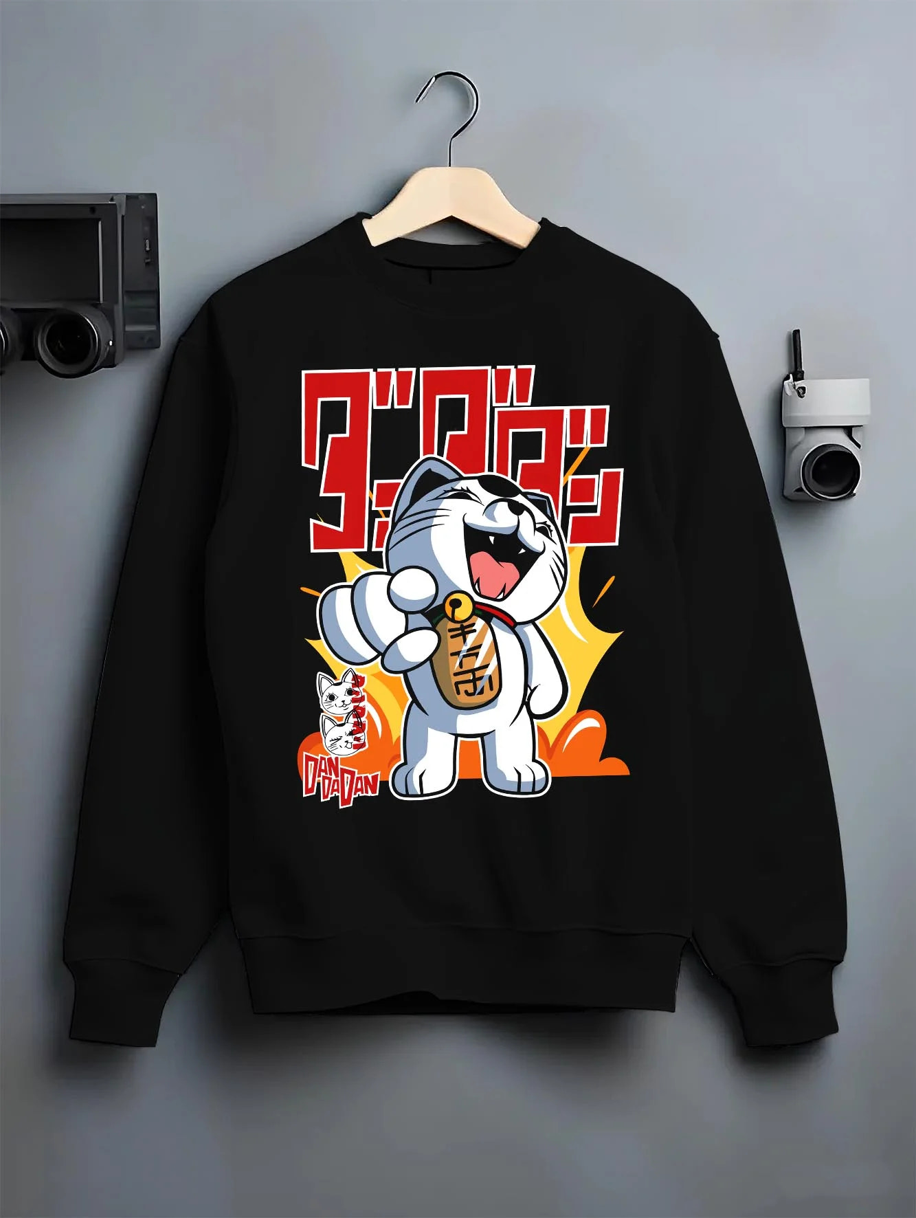 Black crewneck sweatshirt on hanger with Turbo Granny Hoodie Dandadan Ghost Spirit Villain graphic bold anime graphic.