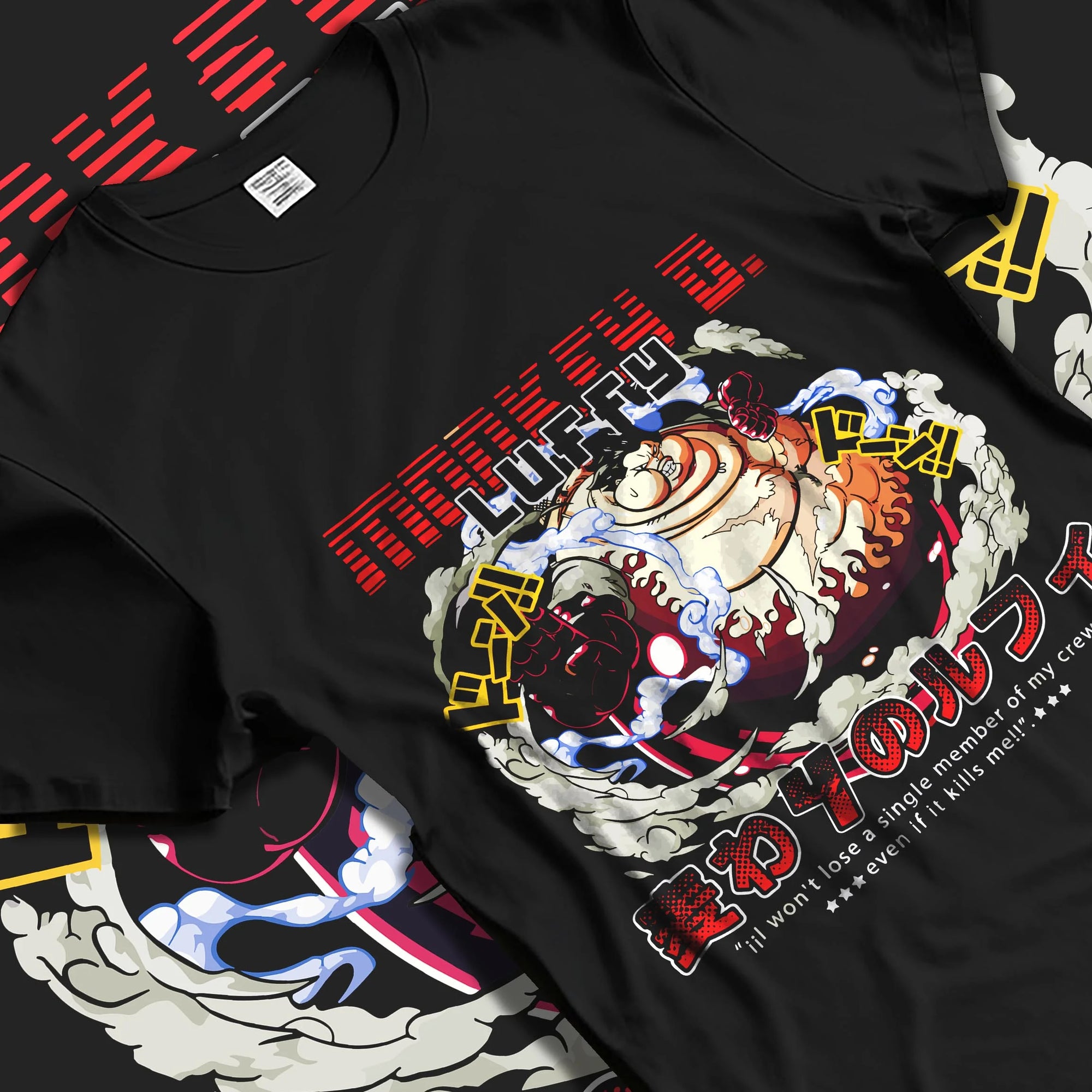 Black T-shirt laid flat with natural folds, featuring retro streetwear graphic of Luffy Gear Fourth from One Piece anime.