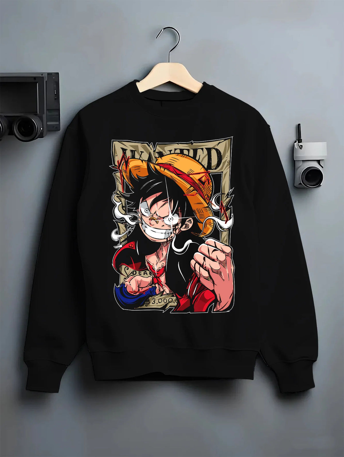 Black crewneck sweatshirt on hanger showing Monkey D. Luffy from One Piece: wanted poster punch