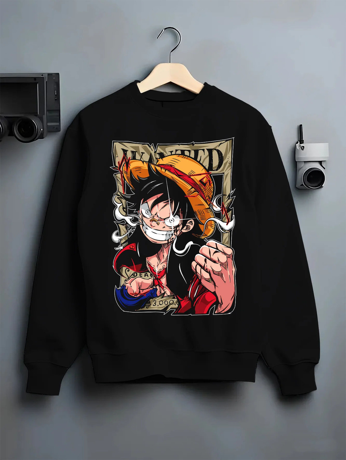 Black crewneck sweatshirt on hanger showing Monkey D. Luffy from One Piece: wanted poster punch