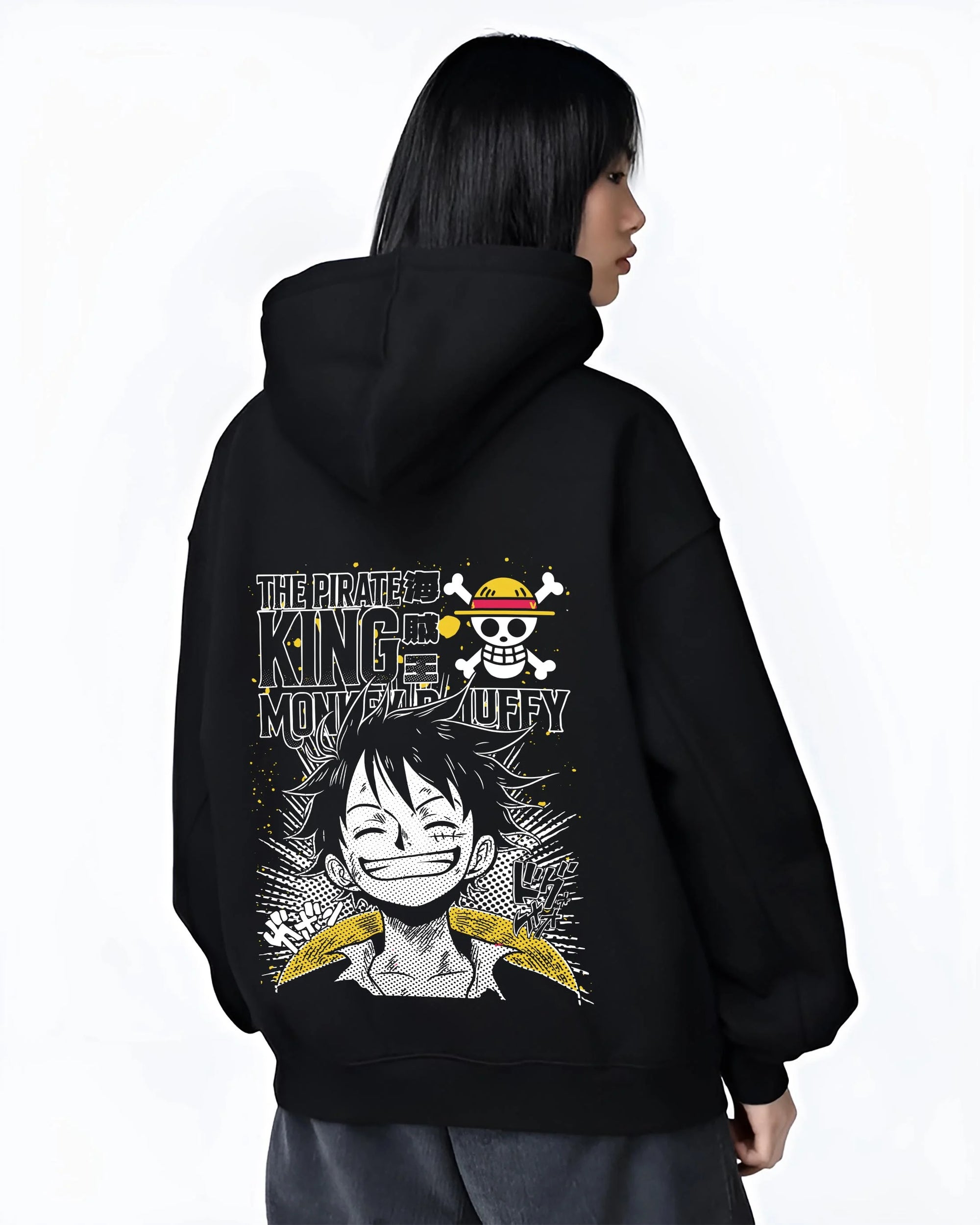 Black hoodie worn by female model, back view with One Piece Bartholomew Kuma Pacifista Hoodie graphic premium wear.
