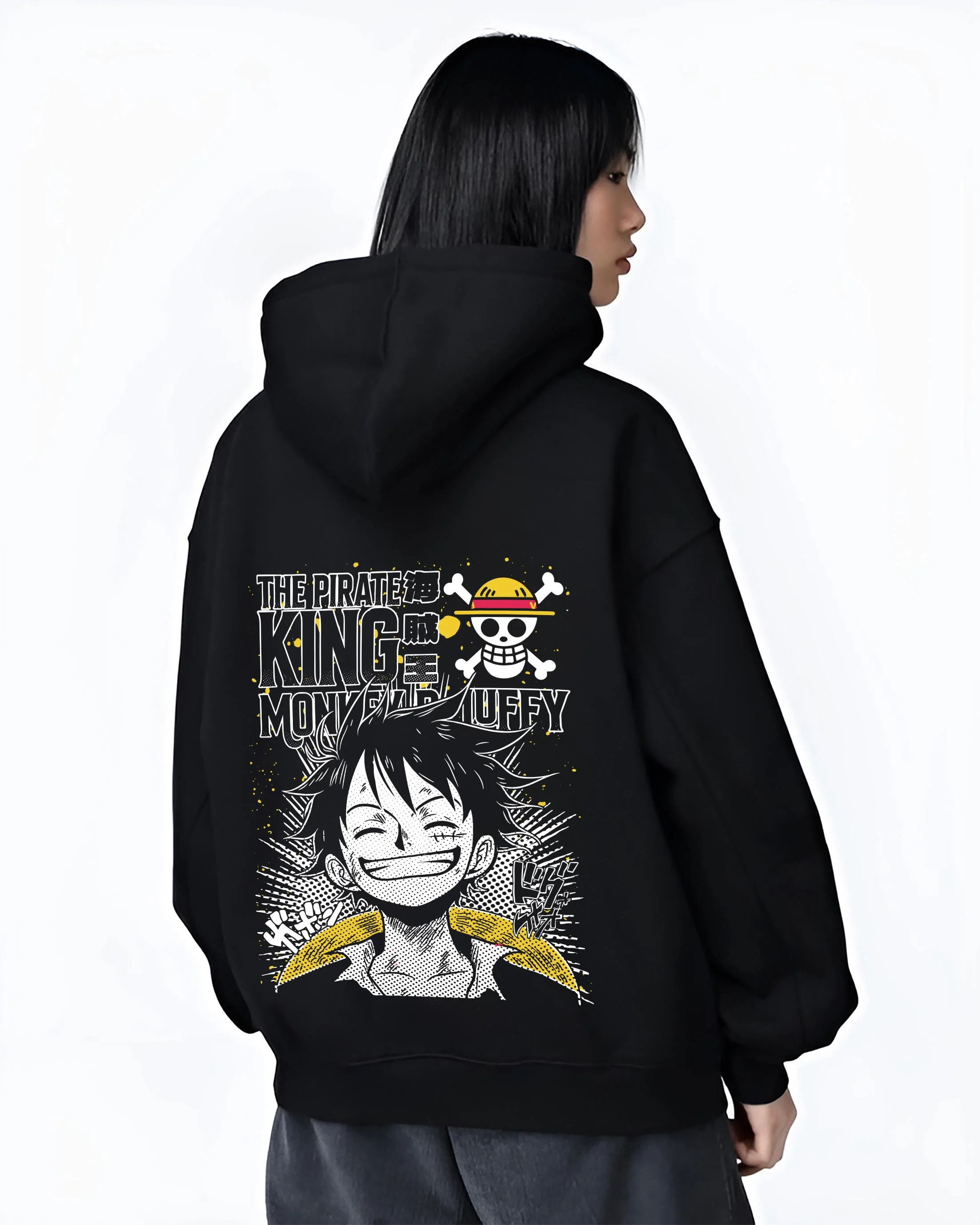 Black hoodie worn by female model, back view with One Piece Bartholomew Kuma Pacifista Hoodie graphic premium wear.