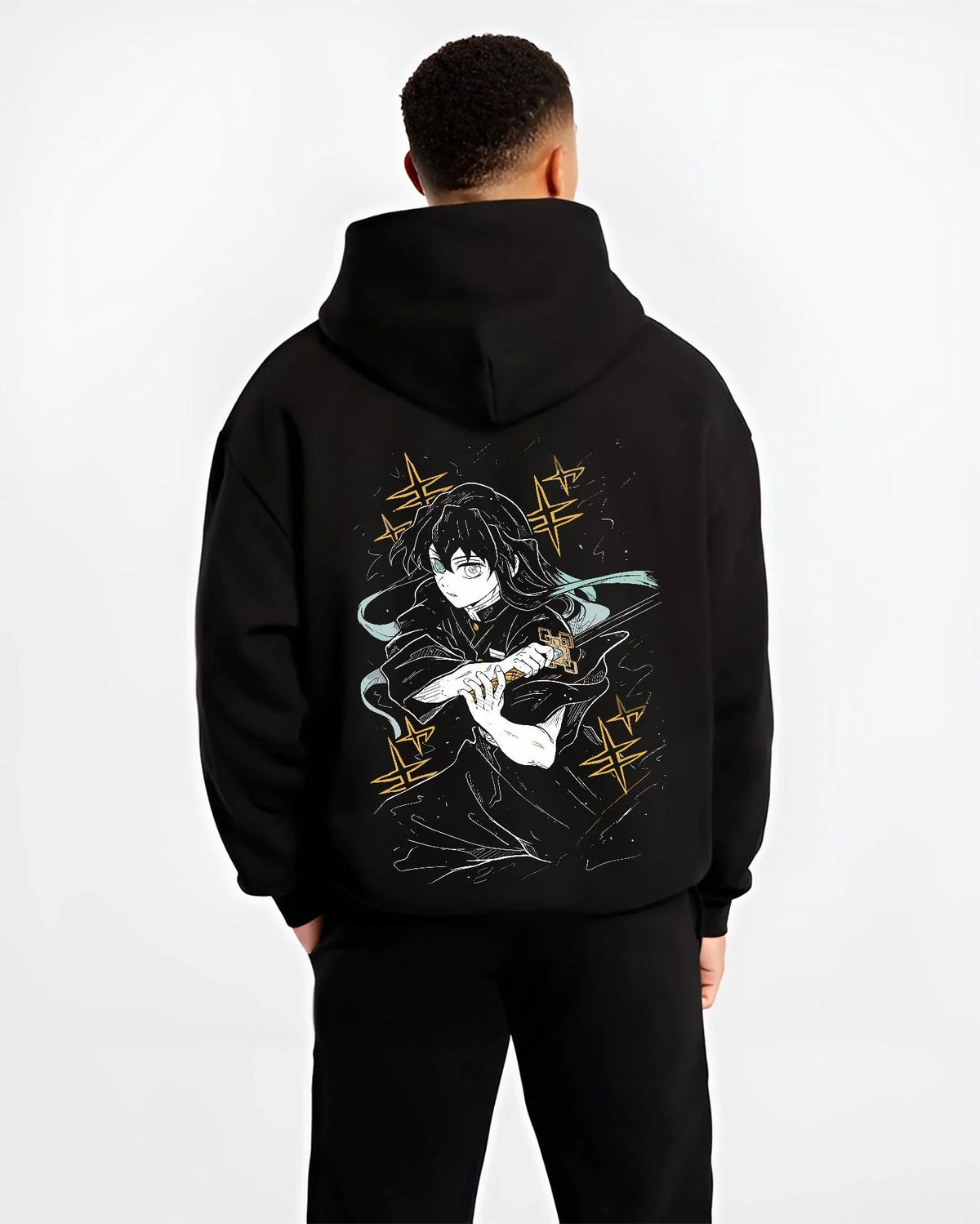 Black hoodie worn by male model from the back featuring Muichiro Tokito Mist Breathing Seventh Form artwork.