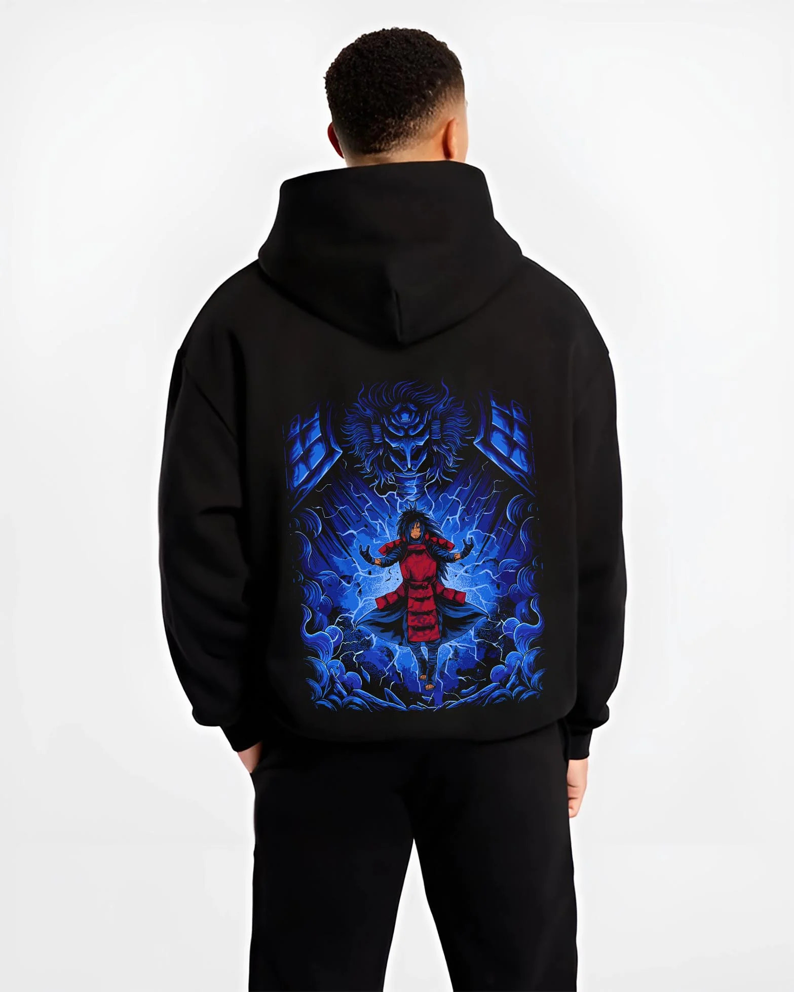 Black hoodie worn by male model, back view with Madara Uchiha Hoodie Naruto Legendary Power graphic bold anime graphic.