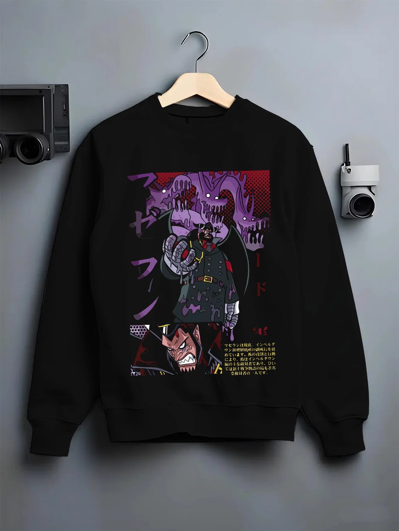 Black crewneck sweatshirt on hanger with Magellan Venom Hoodie One Piece Impel Down graphic premium wear.