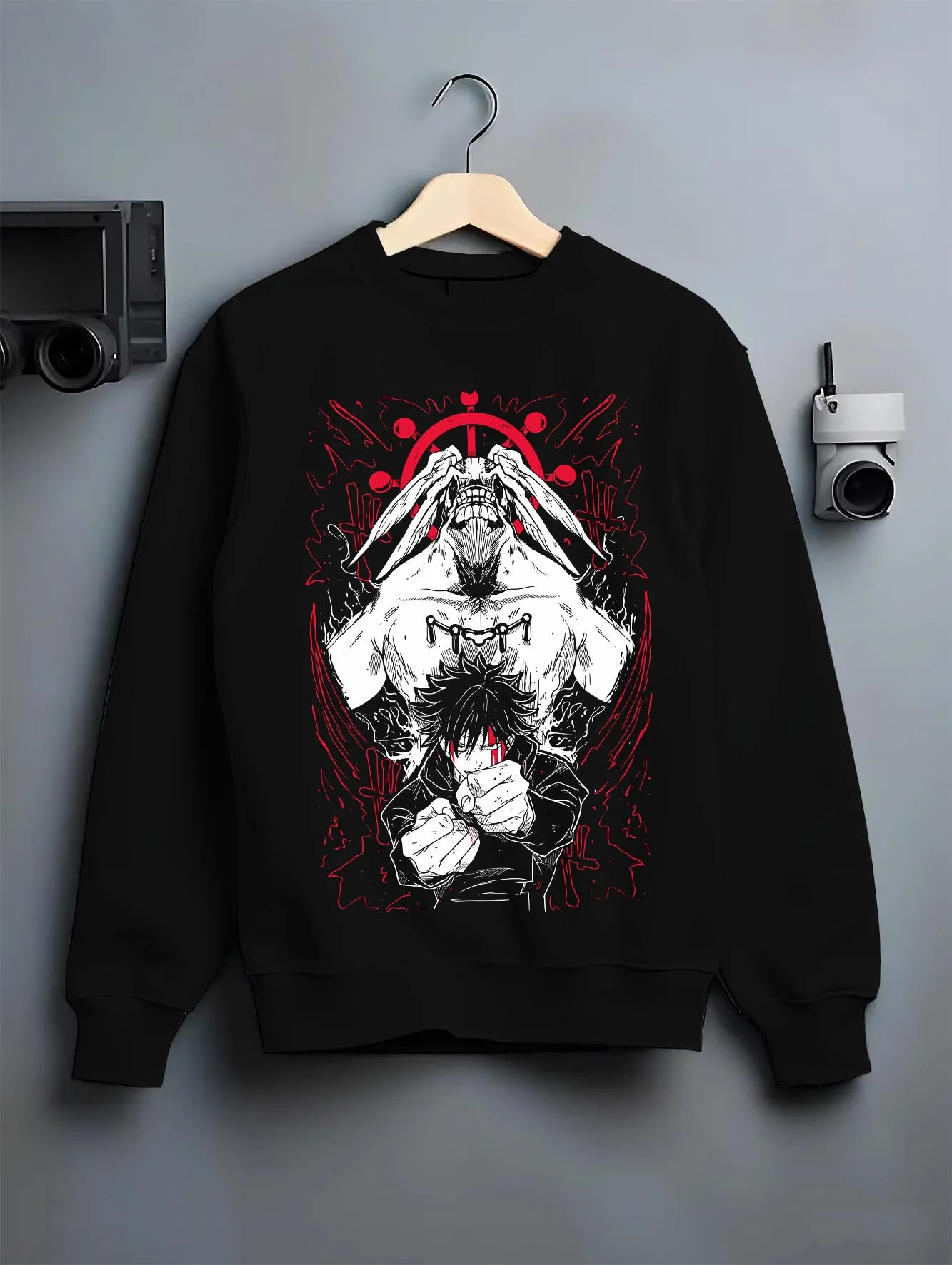 Black crewneck sweatshirt on hanger with Mahoraga Hoodie Jujutsu Kaisen Shikigami Beast graphic streetwear graphic.