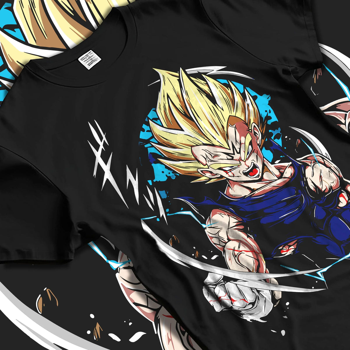 Black T-shirt laid flat with natural folds featuring Majin Vegeta Saiyan rage artwork.