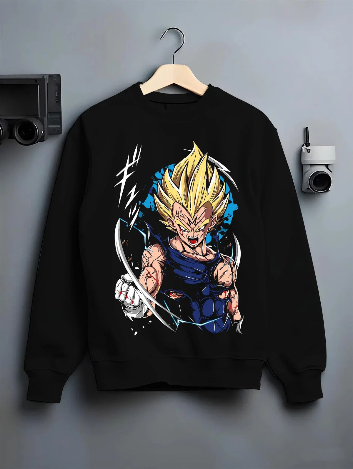 Black crewneck sweatshirt on hanger featuring Majin Vegeta Saiyan rage artwork.