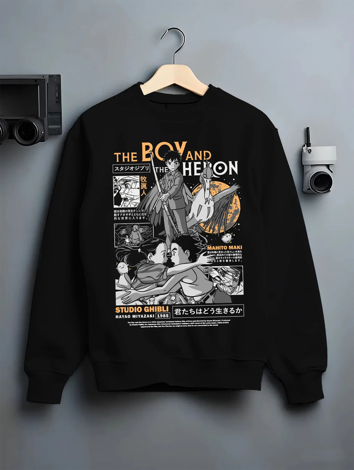 Black crewneck sweatshirt on hanger with Mahito Maki, the Grey Heron and supporting cast from The Boy and the Heron