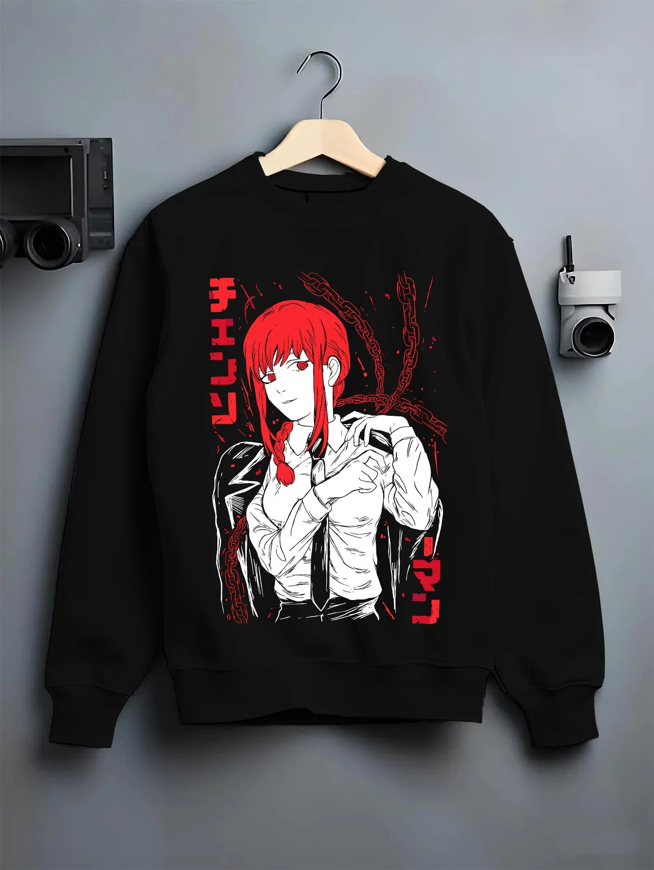 Black crewneck sweatshirt on hanger with Makima Pose Hoodie Chainsaw Man Devilish Style graphic premium wear.