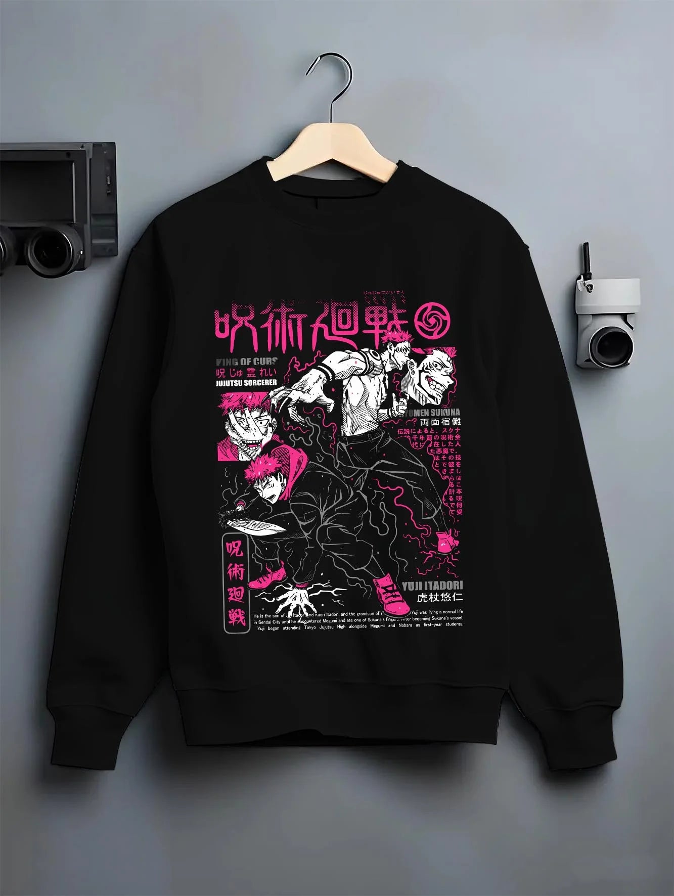 Black crewneck sweatshirt on hanger with Sukuna vs Yuji Hoodie Jujutsu Kaisen Epic Fight graphic bold anime graphic.