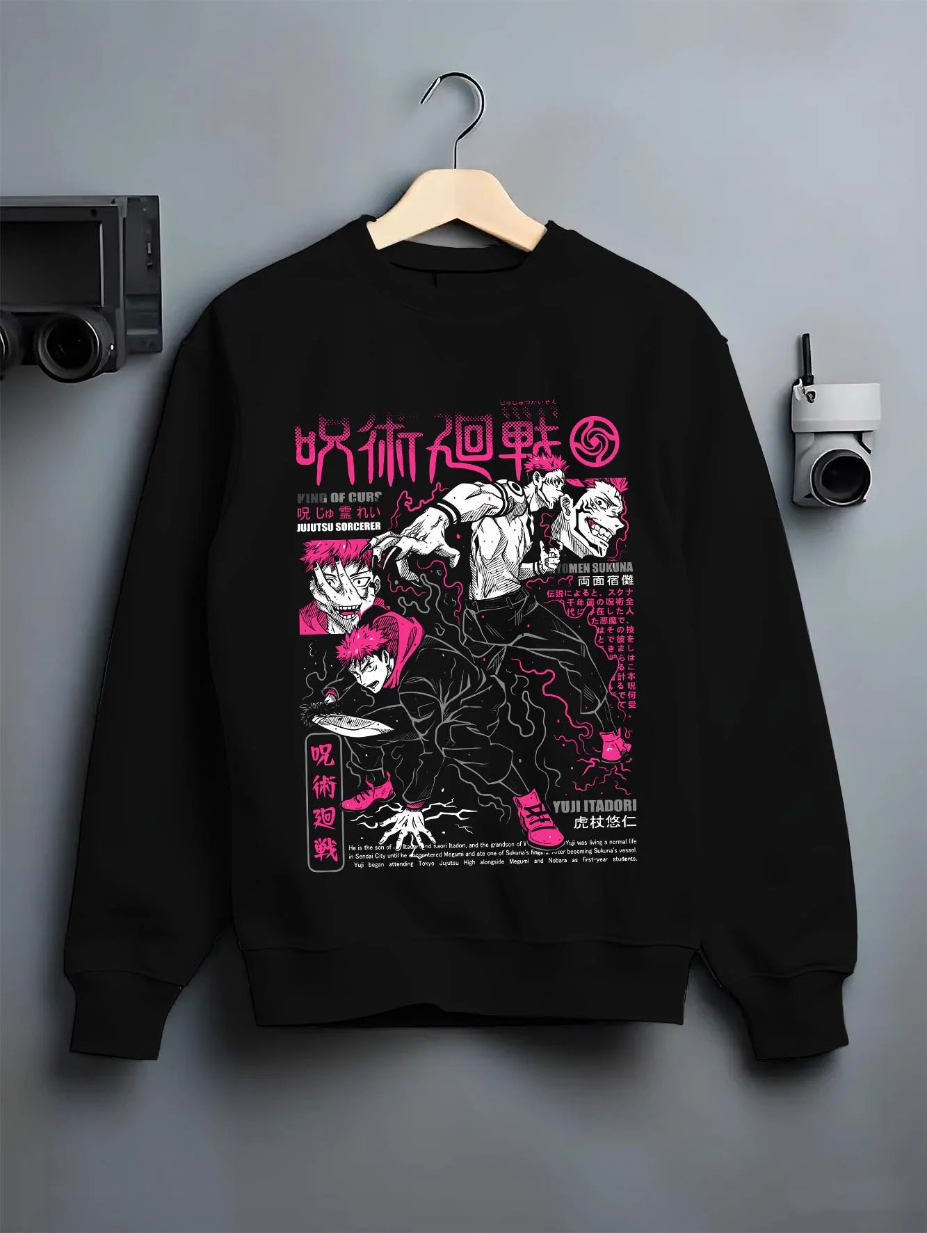 Black crewneck sweatshirt on hanger with Sukuna vs Yuji Hoodie Jujutsu Kaisen Epic Fight graphic bold anime graphic.